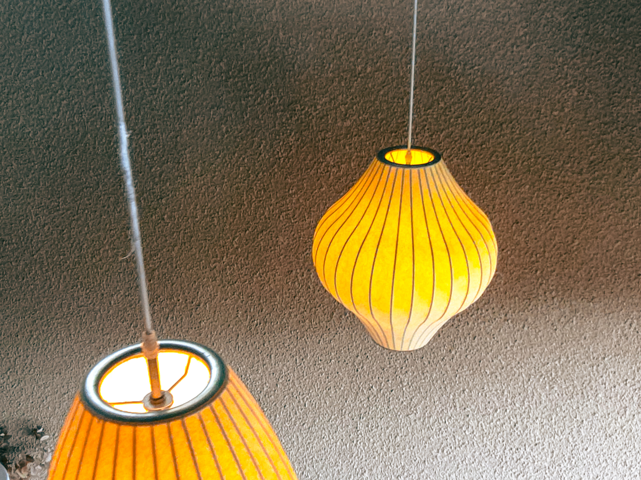 Modern Linear Pendant Light over Minimalist Dining Table