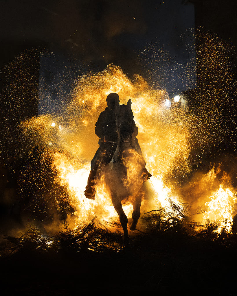 Rider on Horseback Emerges from Flames Symbolizing Courage and ...