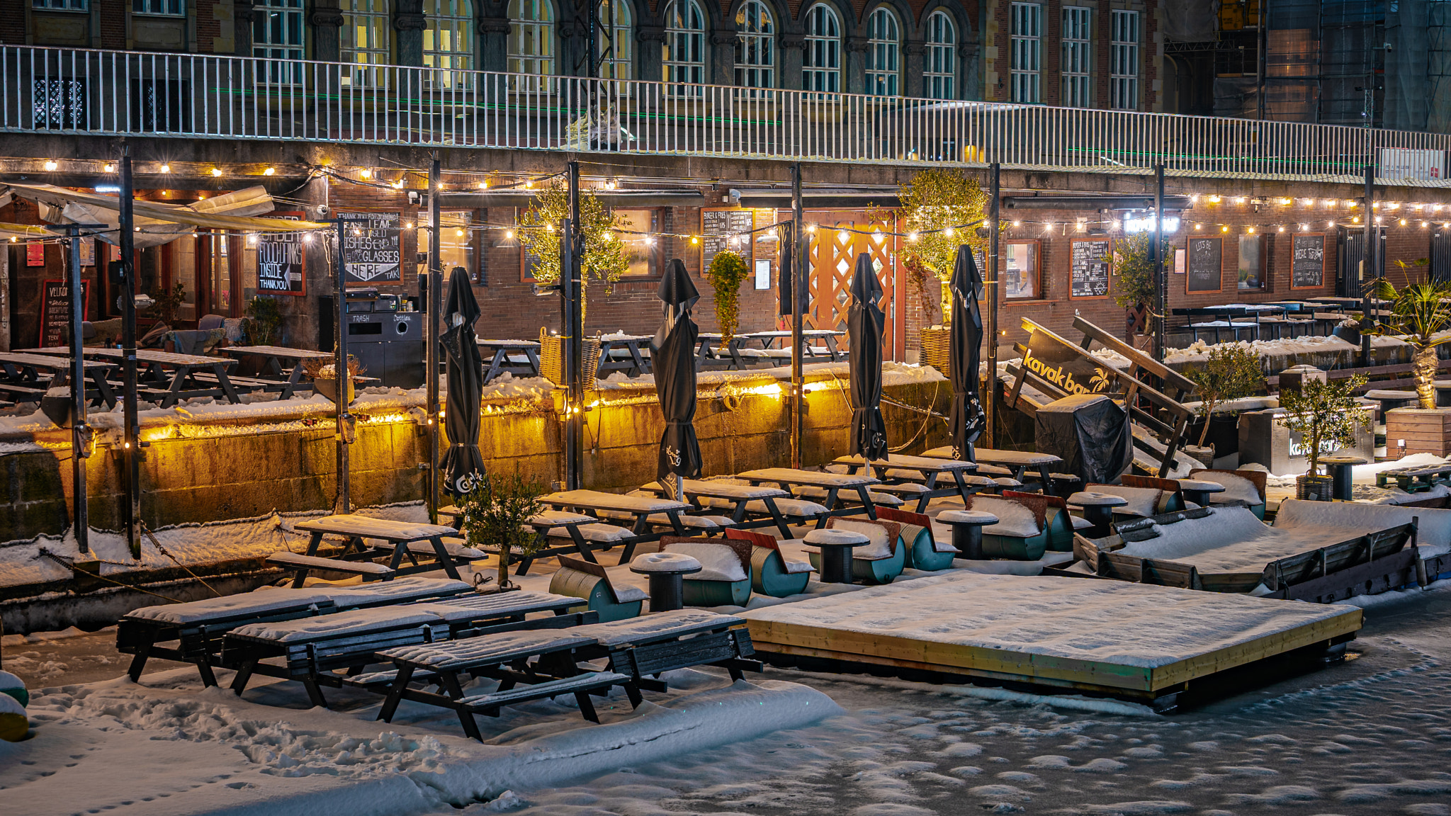 Cozy outdoor café on a winter night