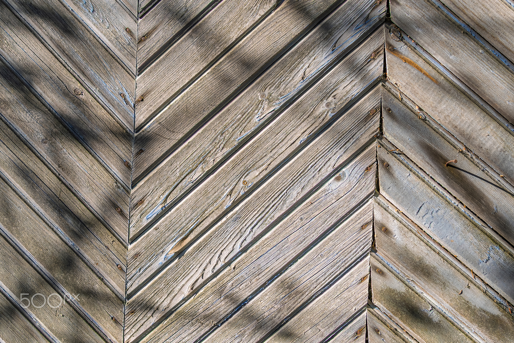 texture of old wooden covering consisting of many wooden elements