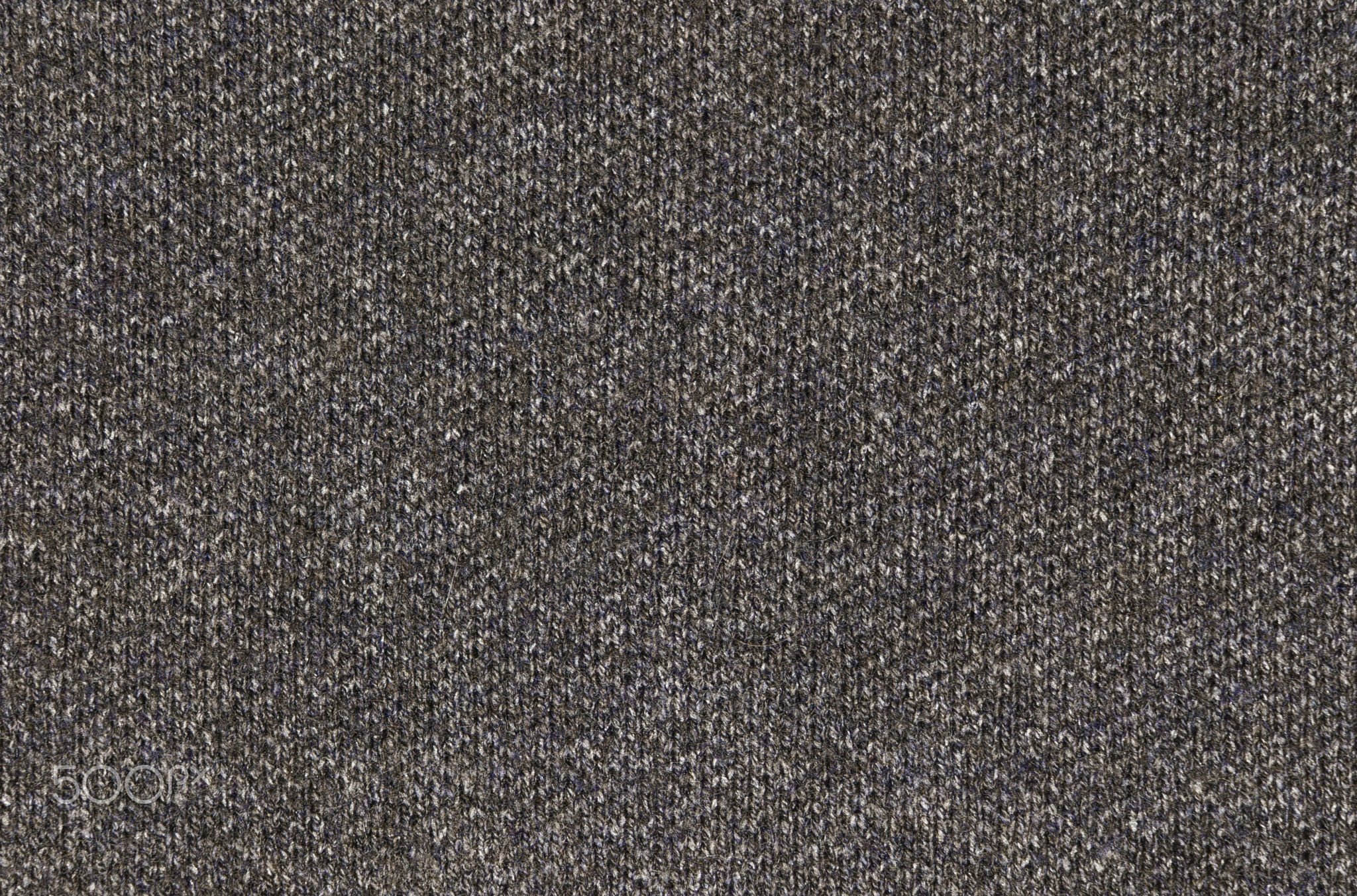 Speckled tweed textile closeup for durable