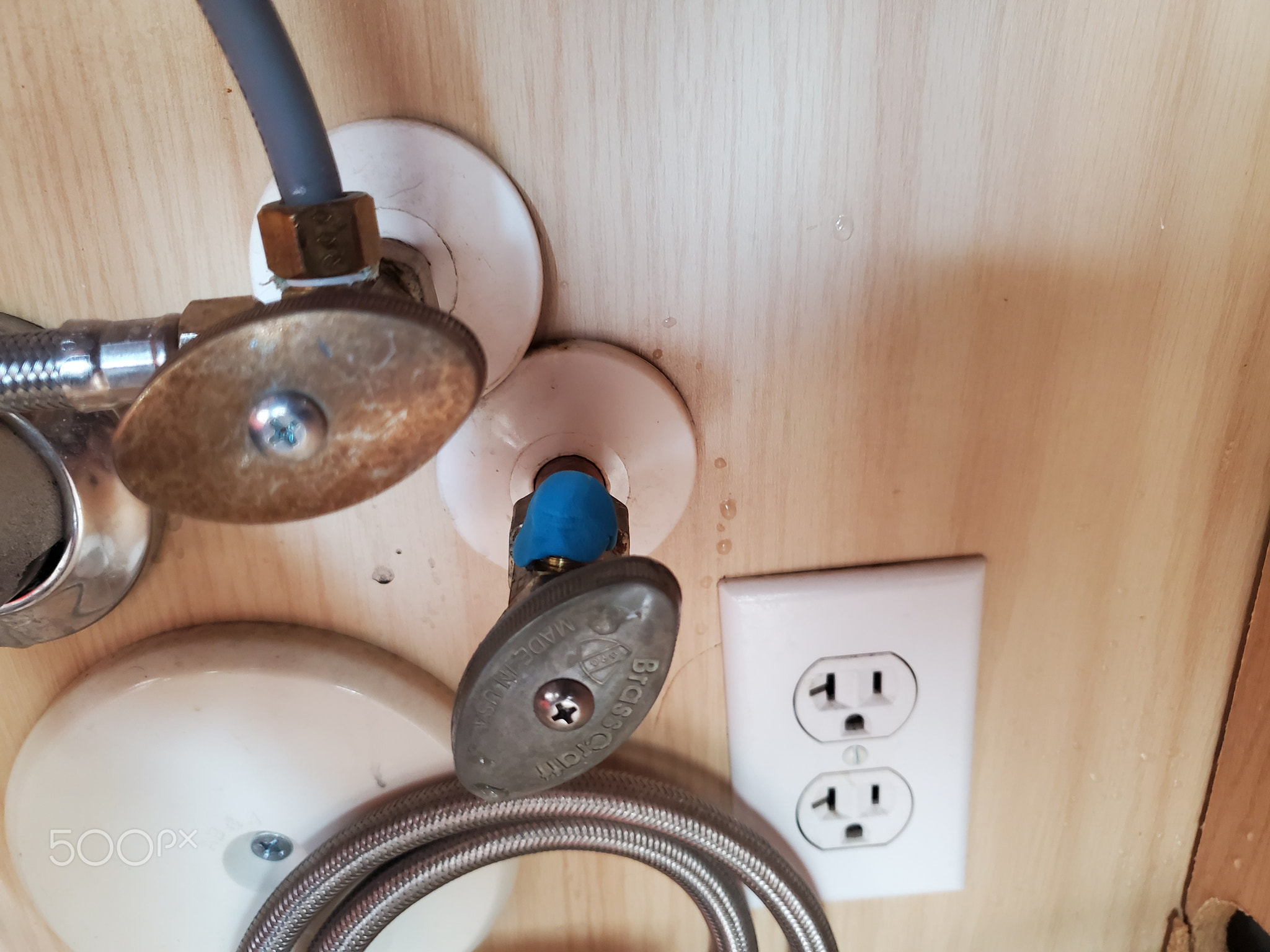 Hot and Cold Water Shut Off Valves Under Kitchen Sink by Outlet