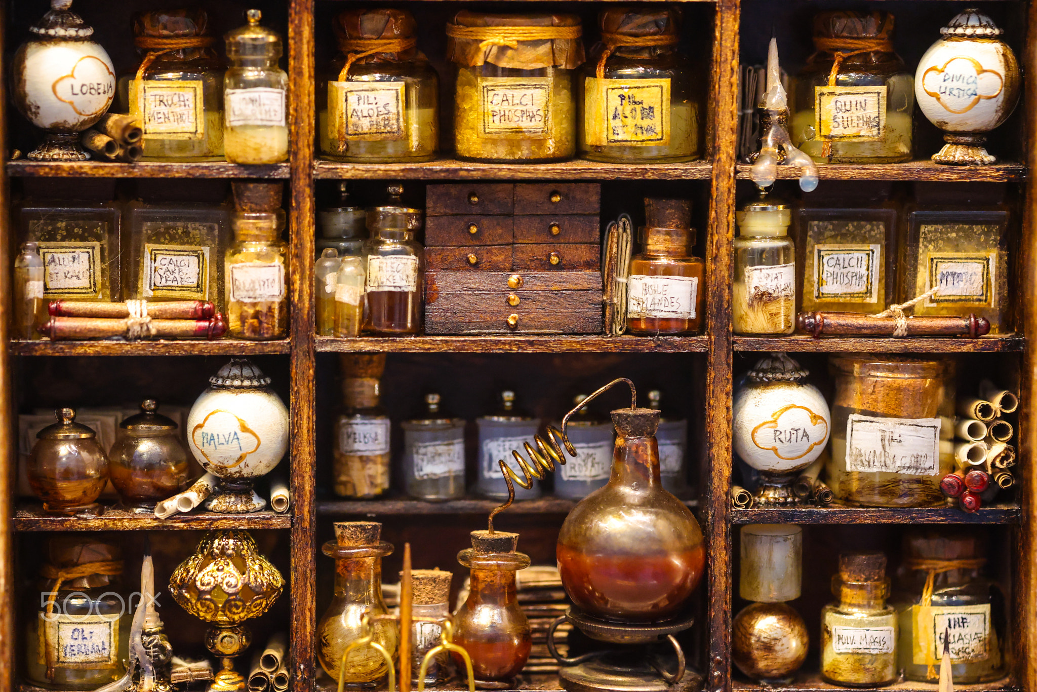 Vintage Apothecary Shelves with Antique Bottles and Alchemy Equipment