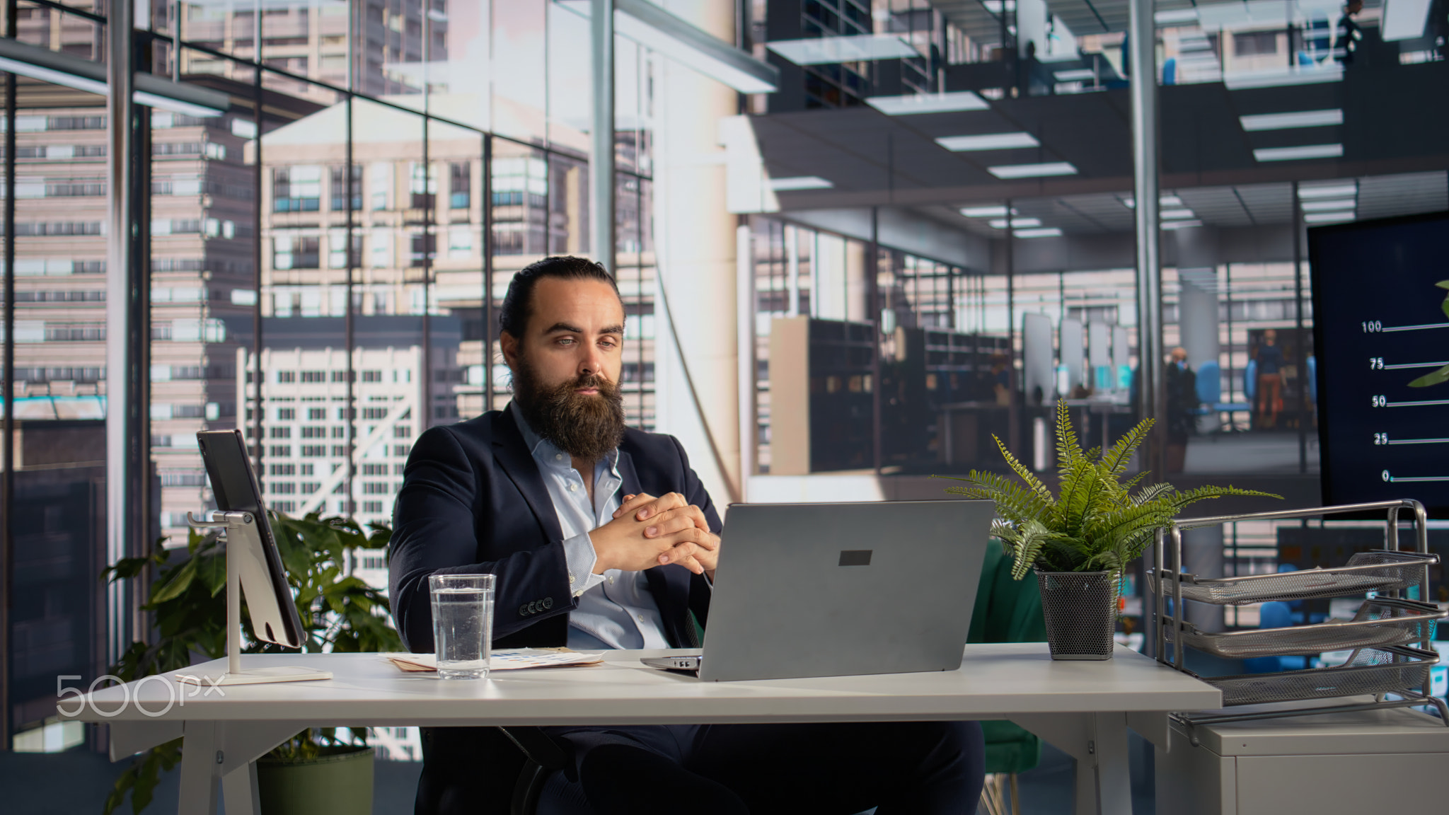 Male professional on video conference for company data briefing
