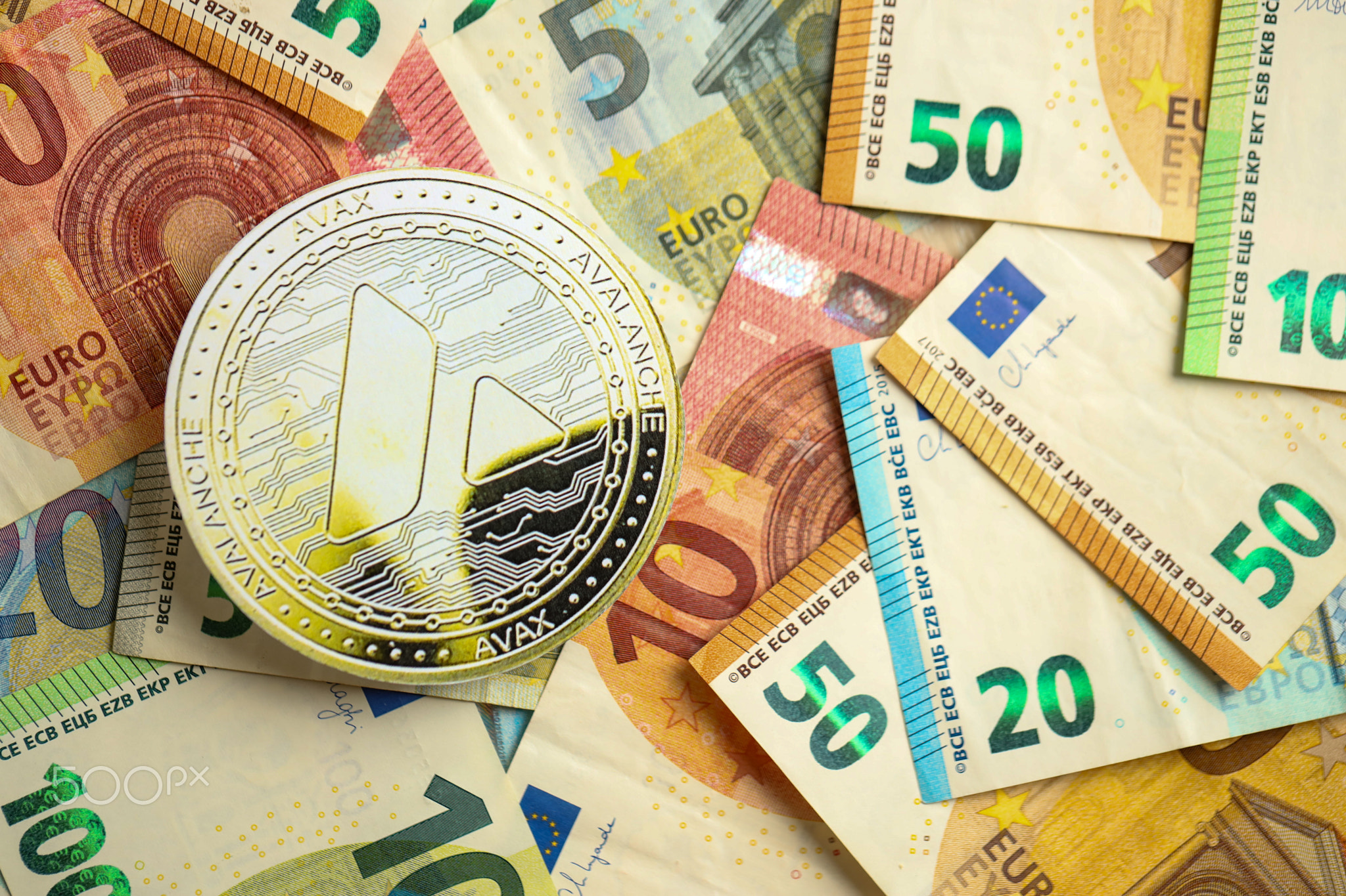 Avalanche AVAX coin with big amount of european euro bills
