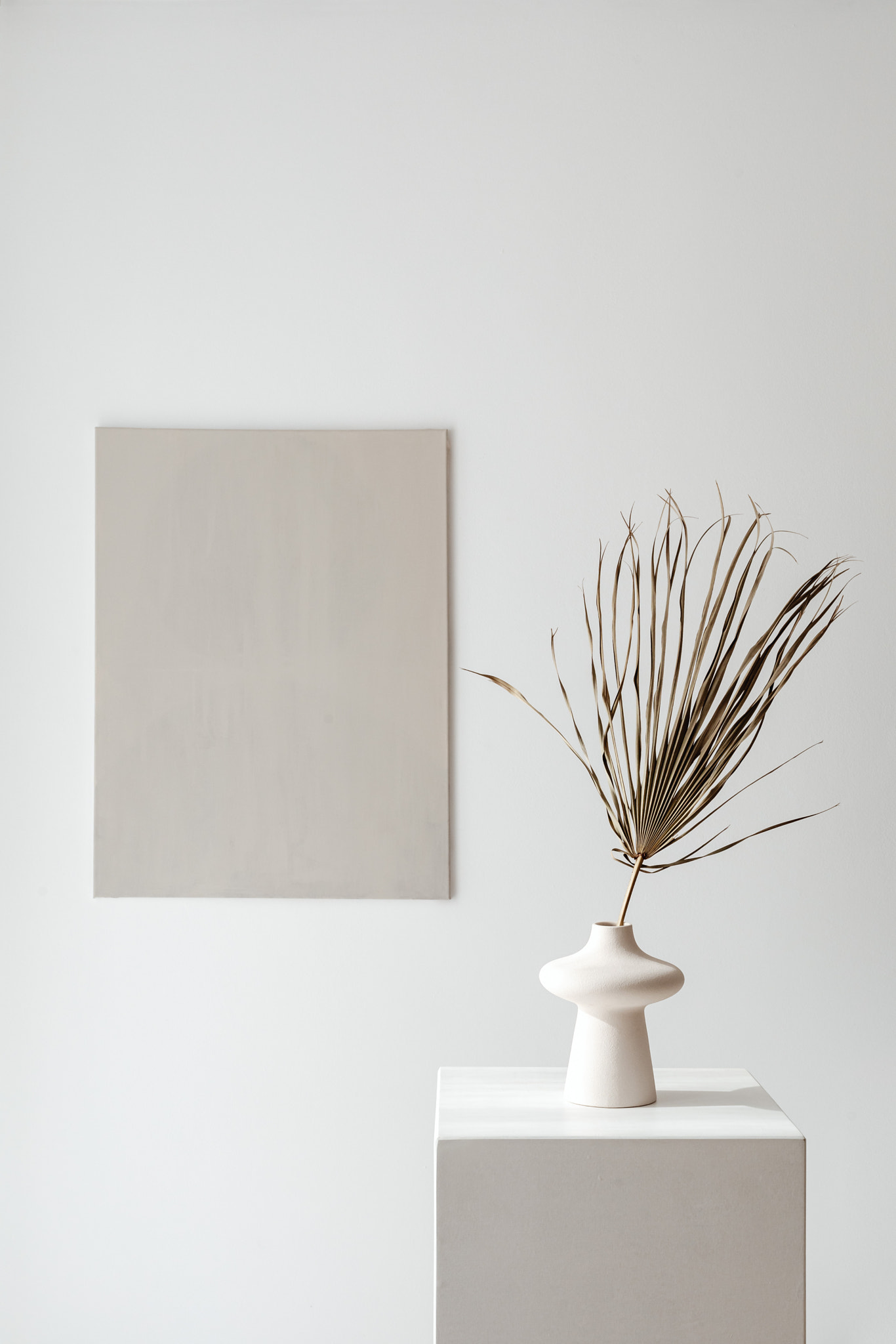 Minimalist Neutral Aesthetic Still Life with Dried Palm and Blank Canvas Mockup
