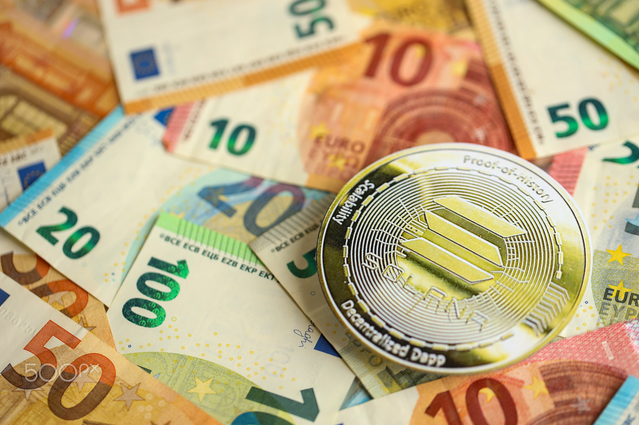 Solana SOL coin with big amount of european euro bills