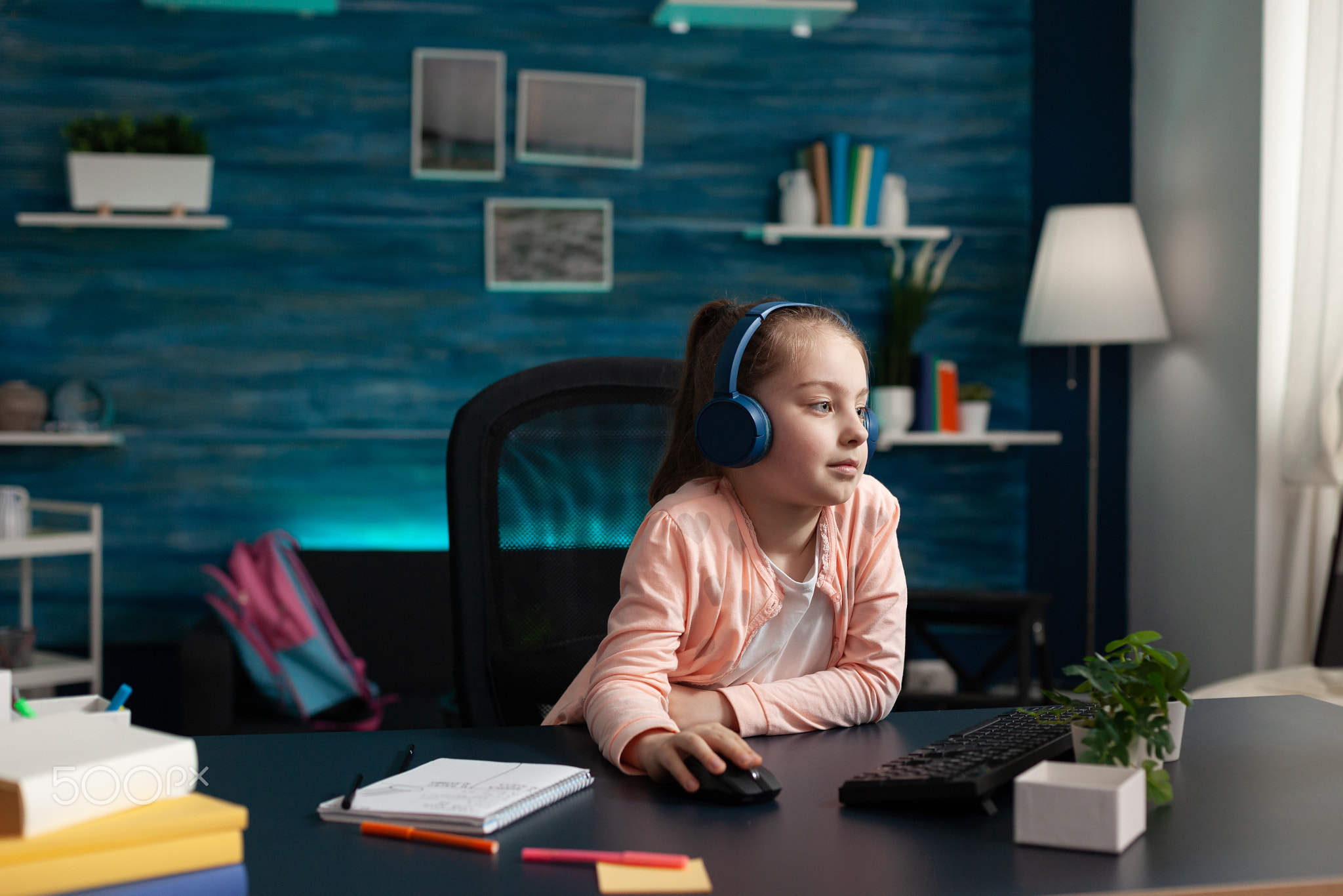 Modern school pupil paying attention to online class
