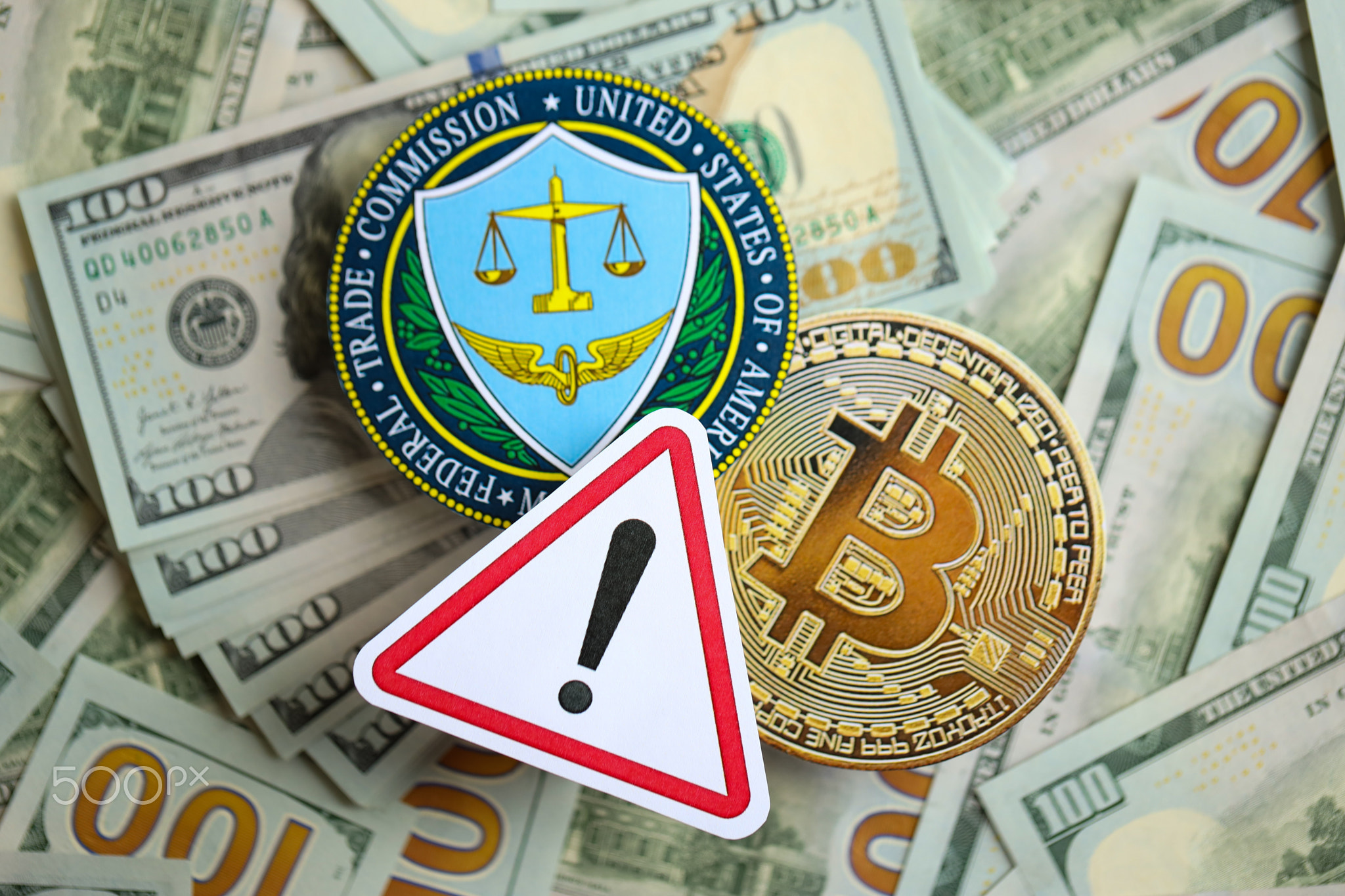 Bitcoin BTC coin and US Federal Trade Commission sign on many USD dollar money bills