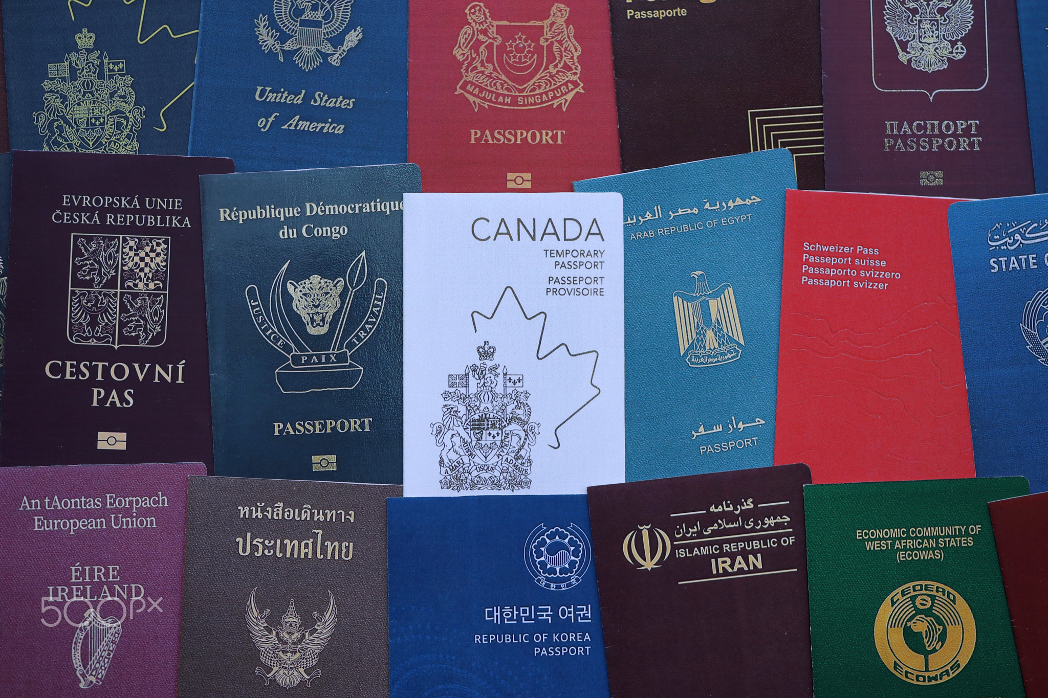 Big amount of passports of various different countries. Covers of expired passports close up