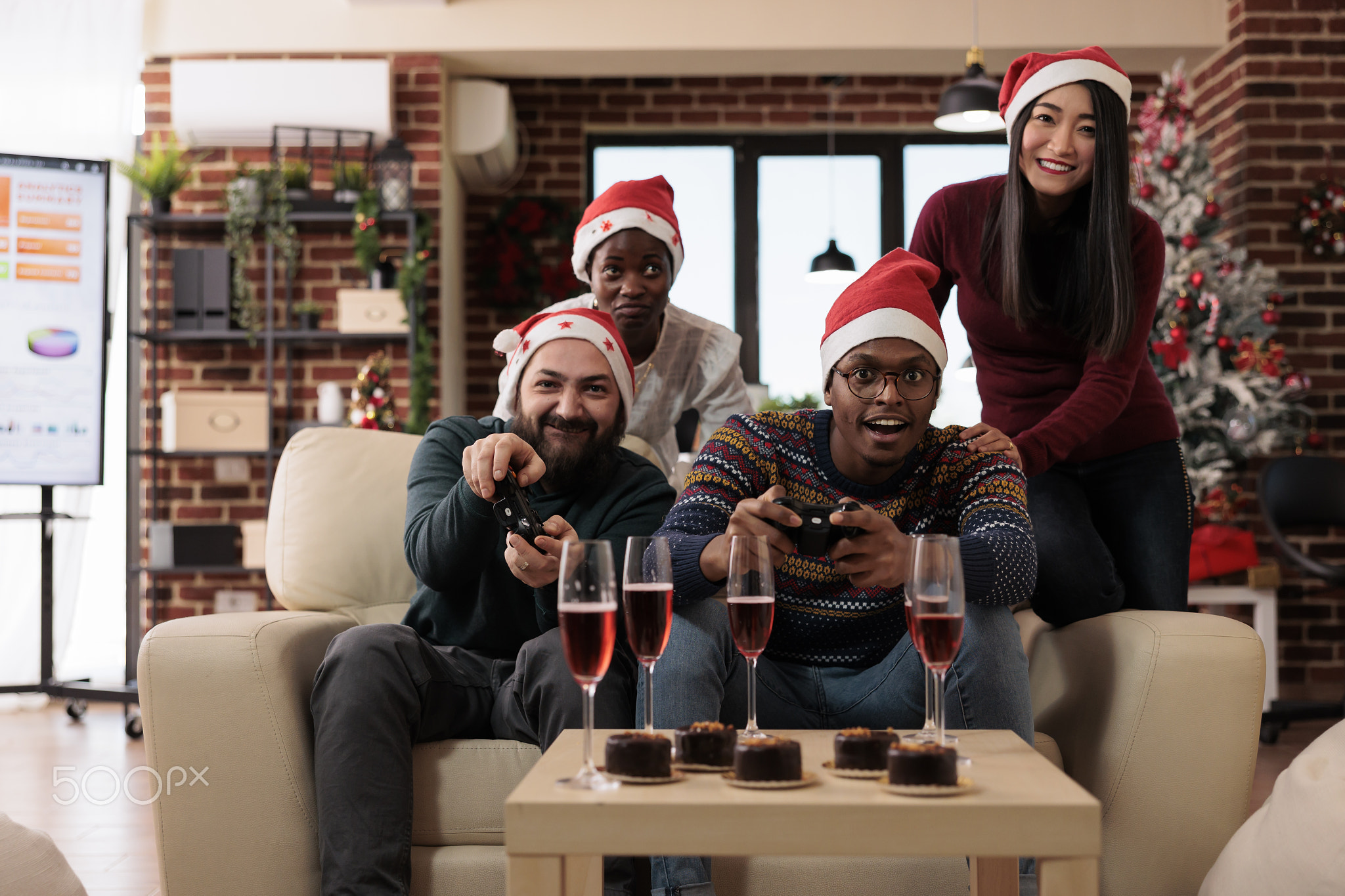 Multiethnic group of people playing video games