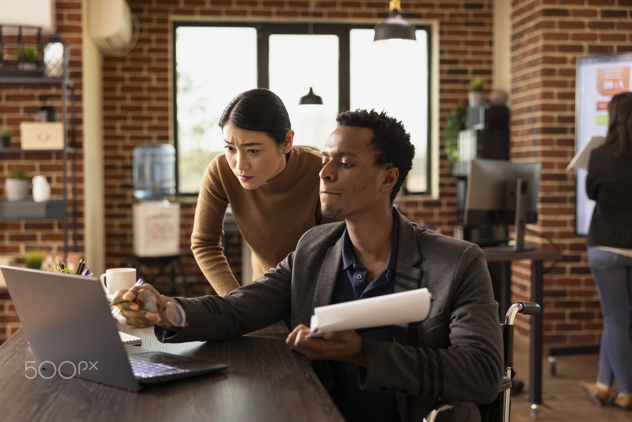 Man and woman analyzing business data