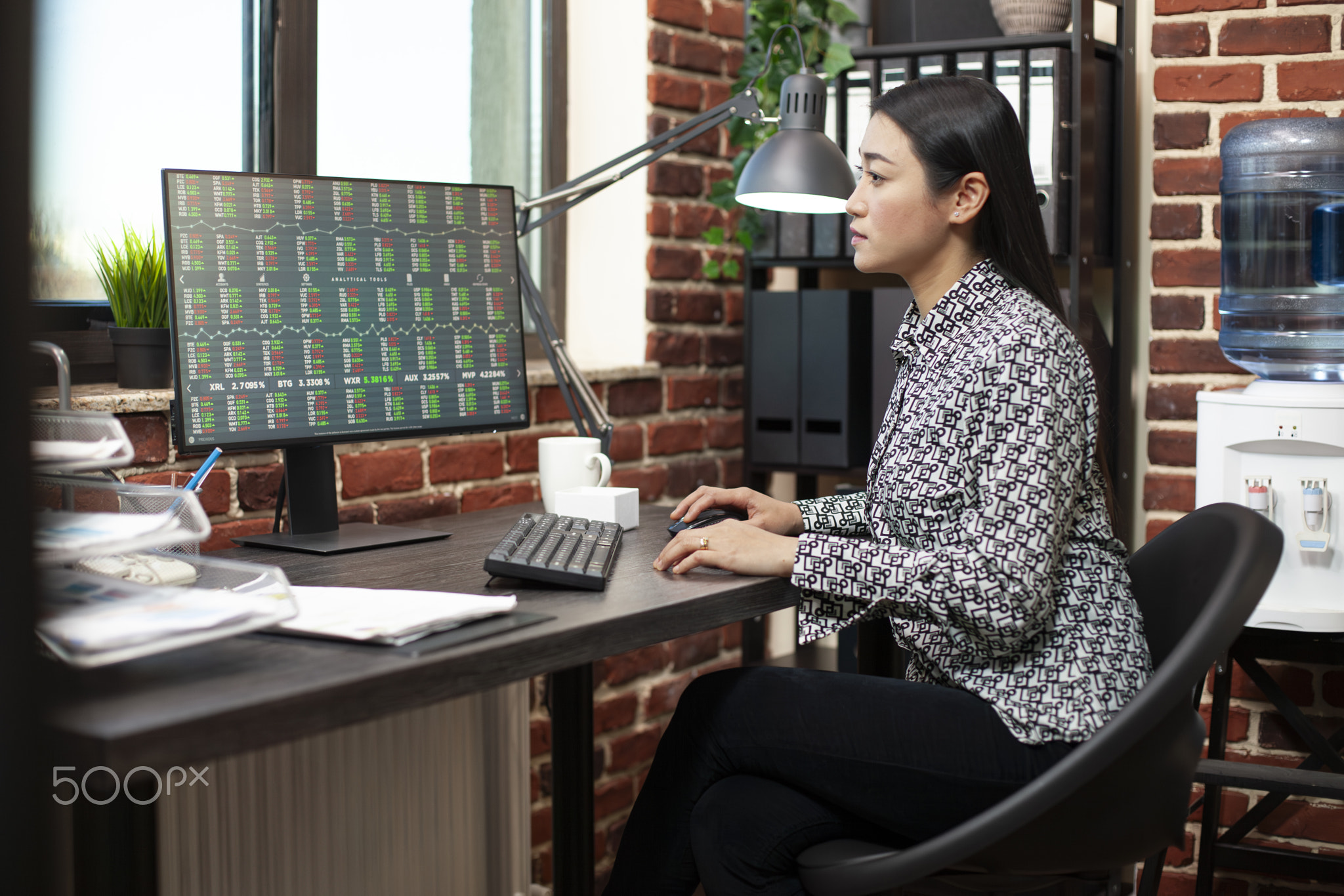Asian woman researching financial trends