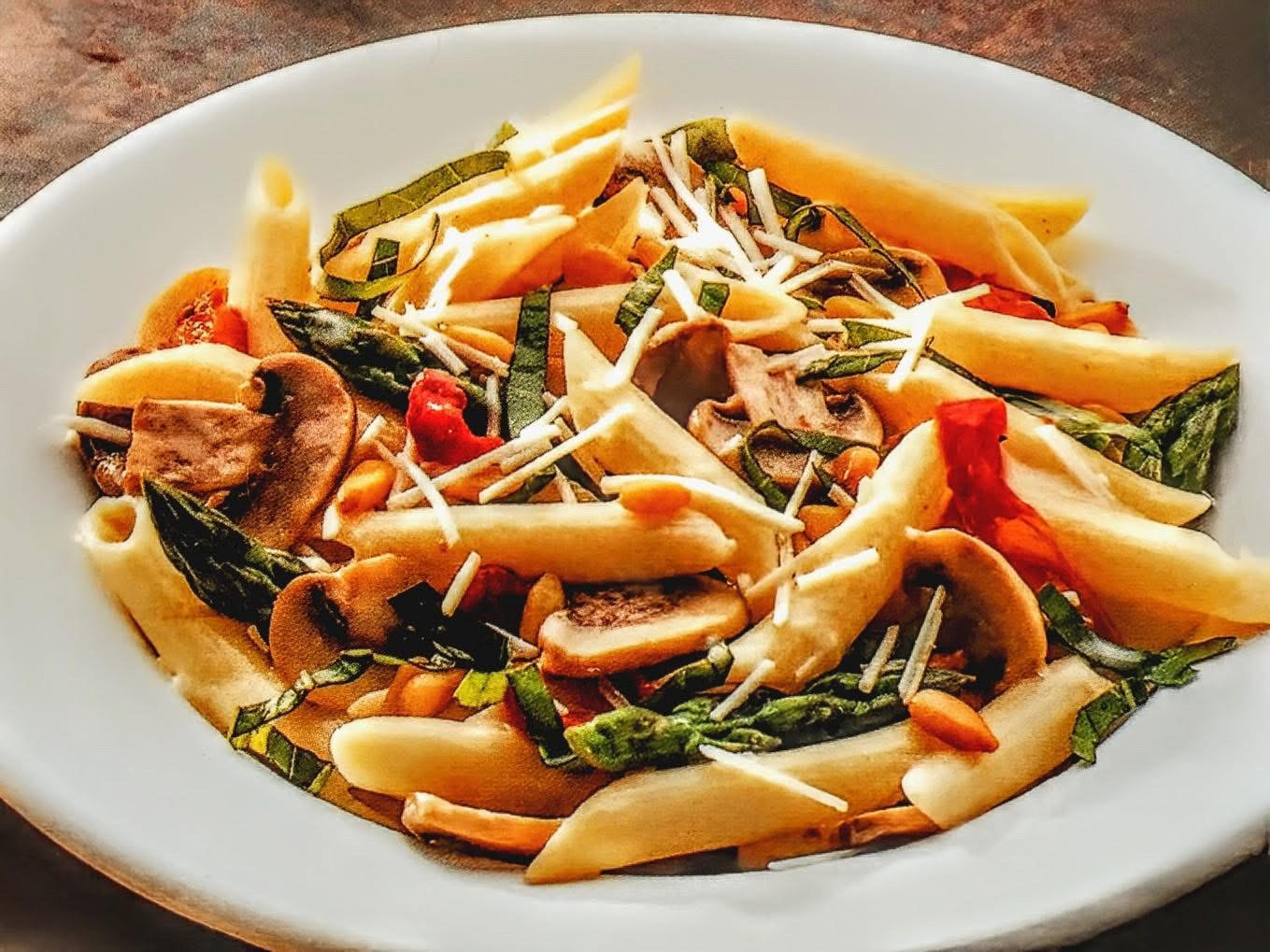 High angle view of Pasta Primavera with Parmesan Broth