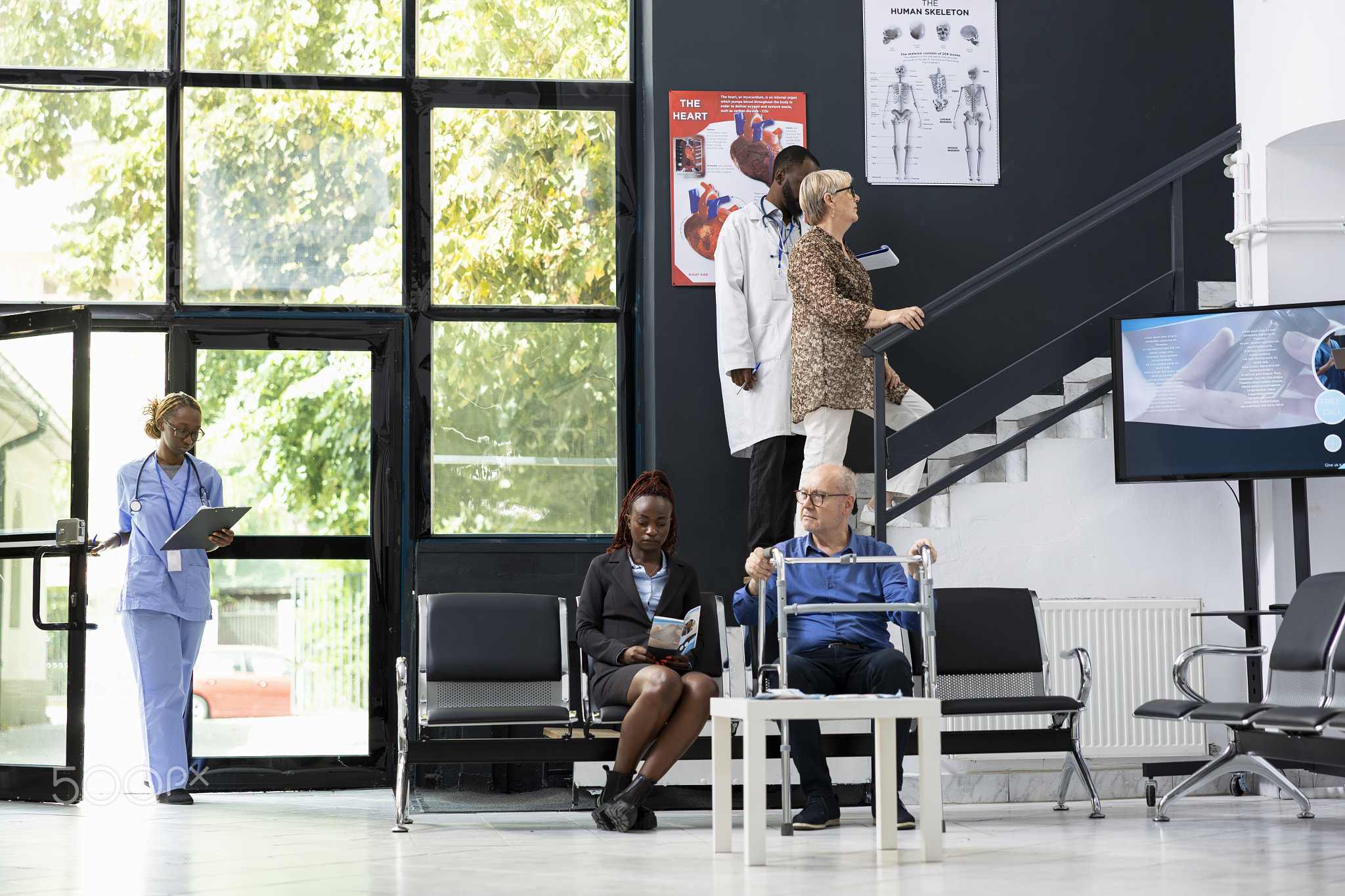 Different people sitting in clinic waiting area for checkup exam or discussion