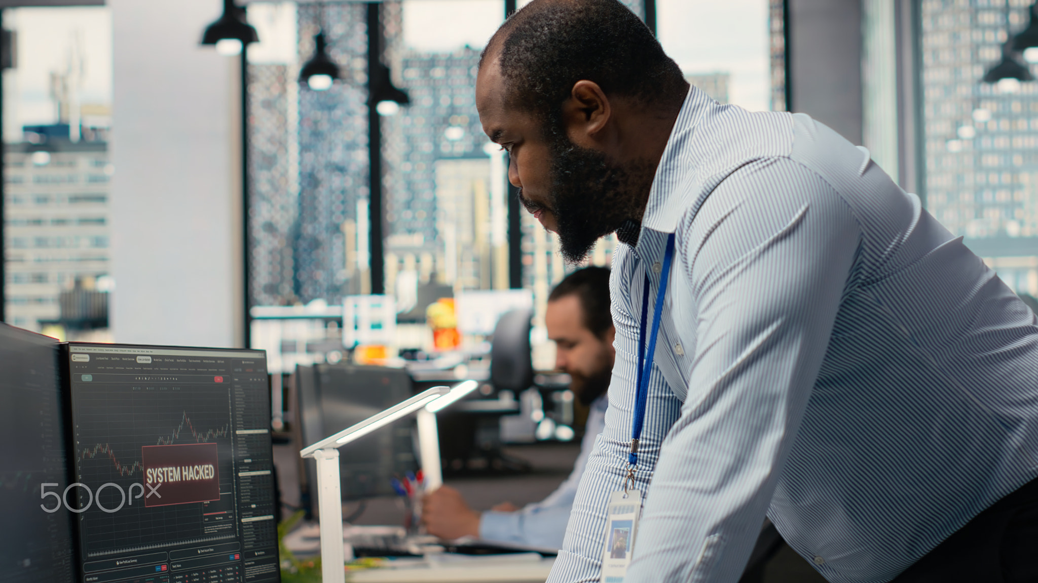 Trader in office alerted by hacking alert on trading platform dashboard