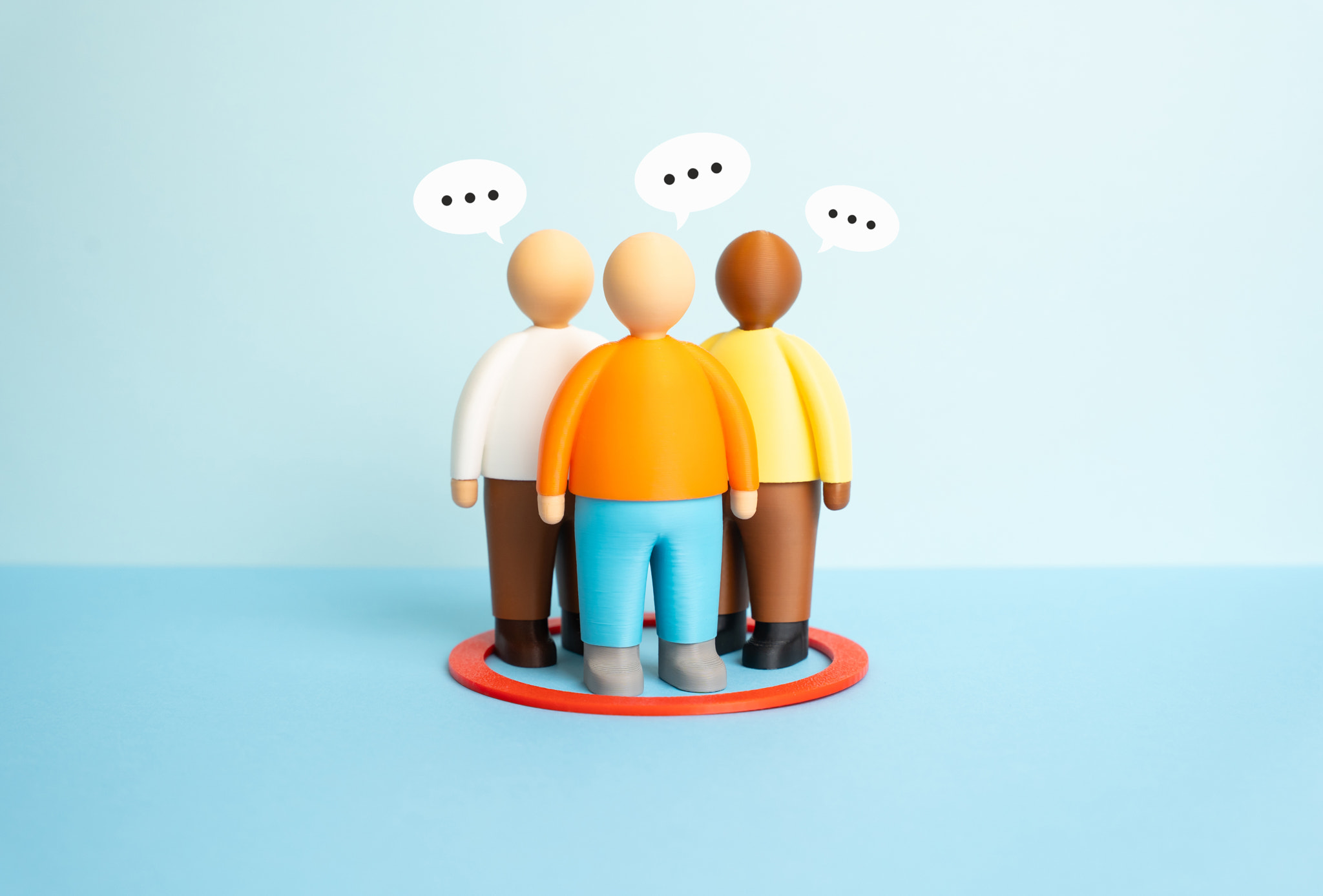 A group of people stands inside a red circle showing an interest group. Social connection and shared