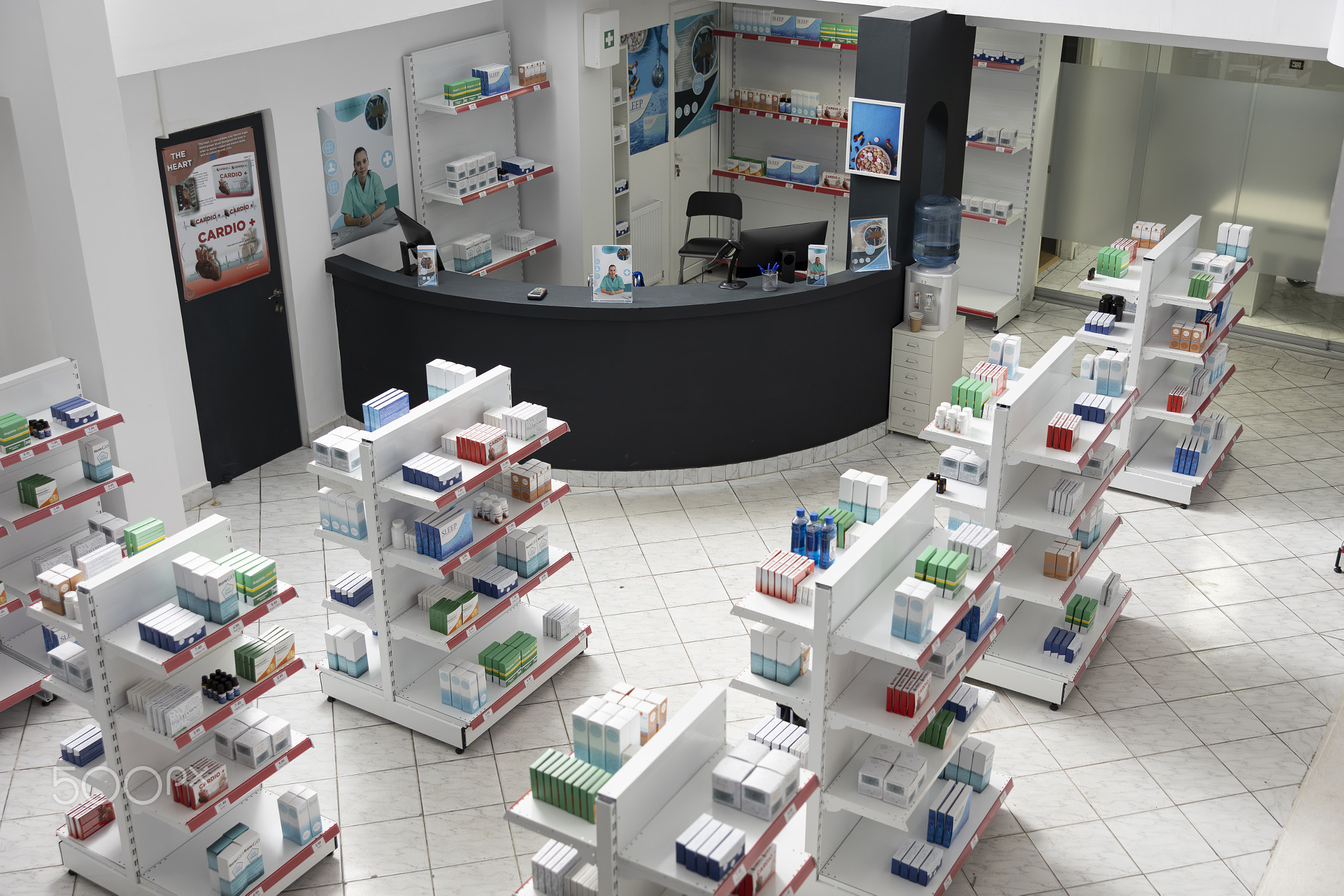 Empty bright apothecary store filled with drugs and pills on shelves