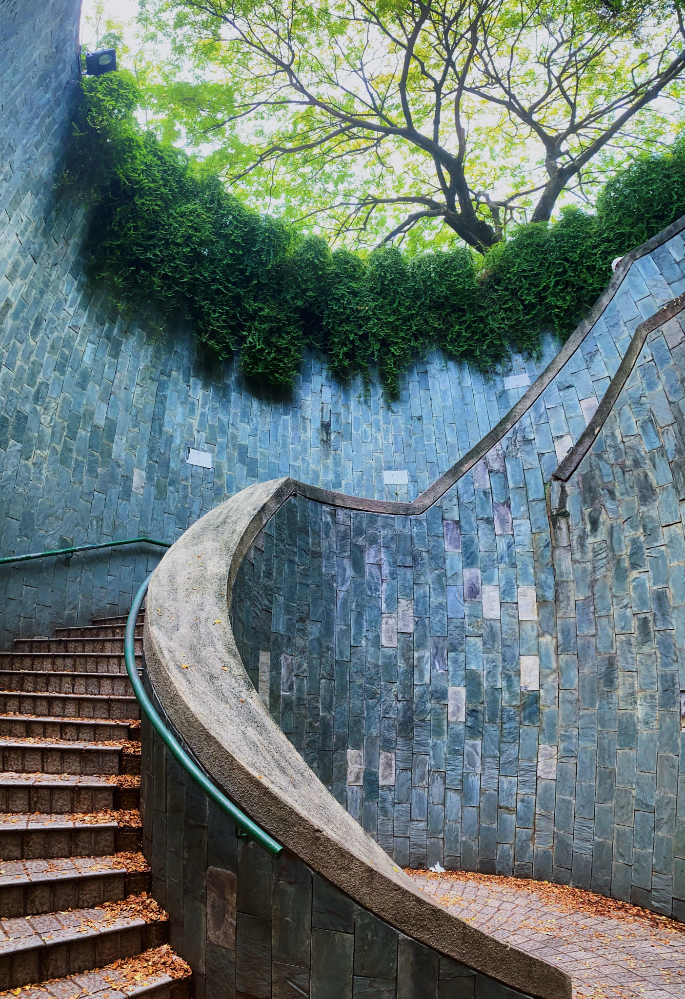 Minimalist Architecture Stairway with Organic Green Elements in Fort Canning Park, Singapore