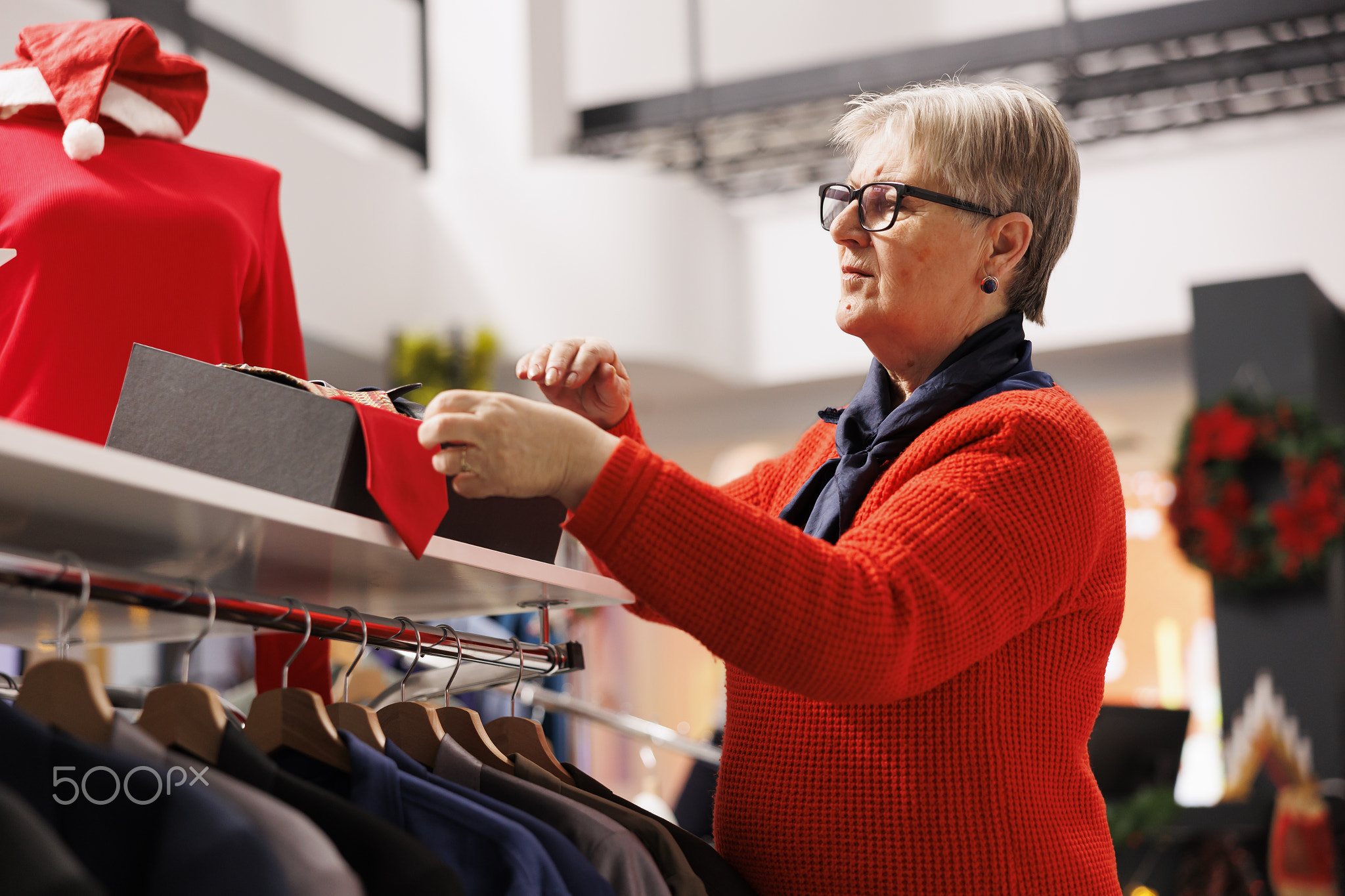 Buyer checking box of items in store