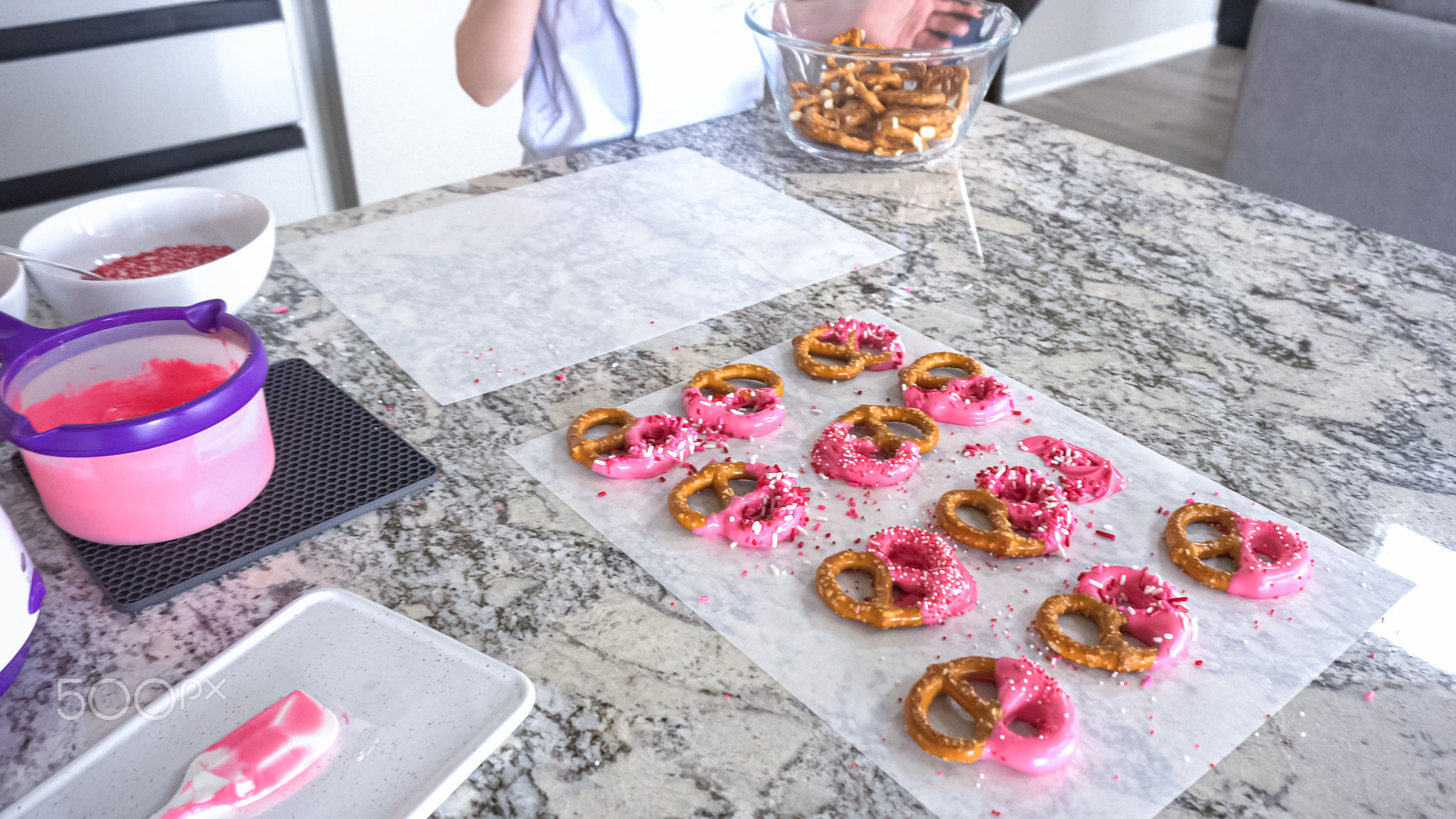 Young Chef Prepares Chocolate-Covered Treats in Sunny Kitchen