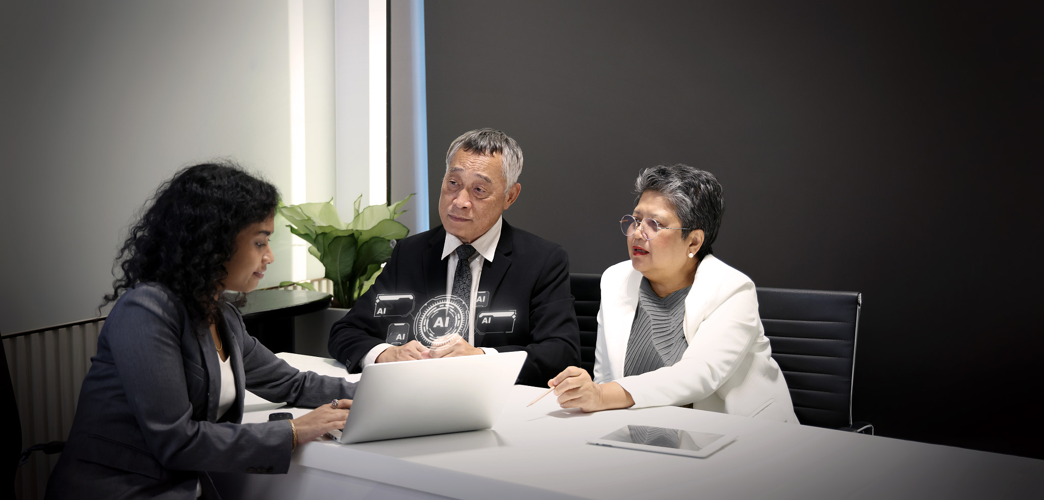 Using Ai. Business team discussing AI analytics and digital strategy in meeting.