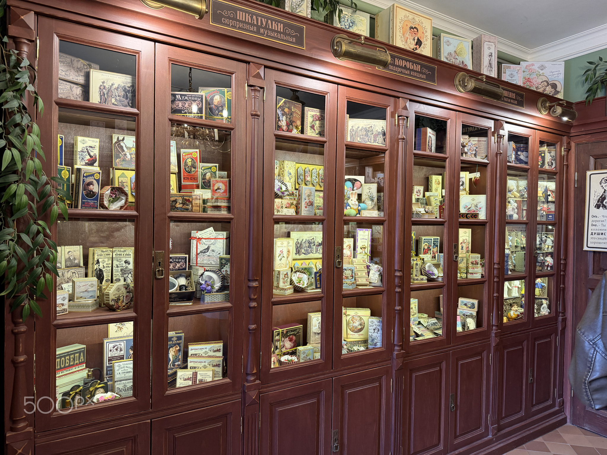 Kolomna, Russia - April 06, 2026: Vintage display cabinet filled with historical artifacts