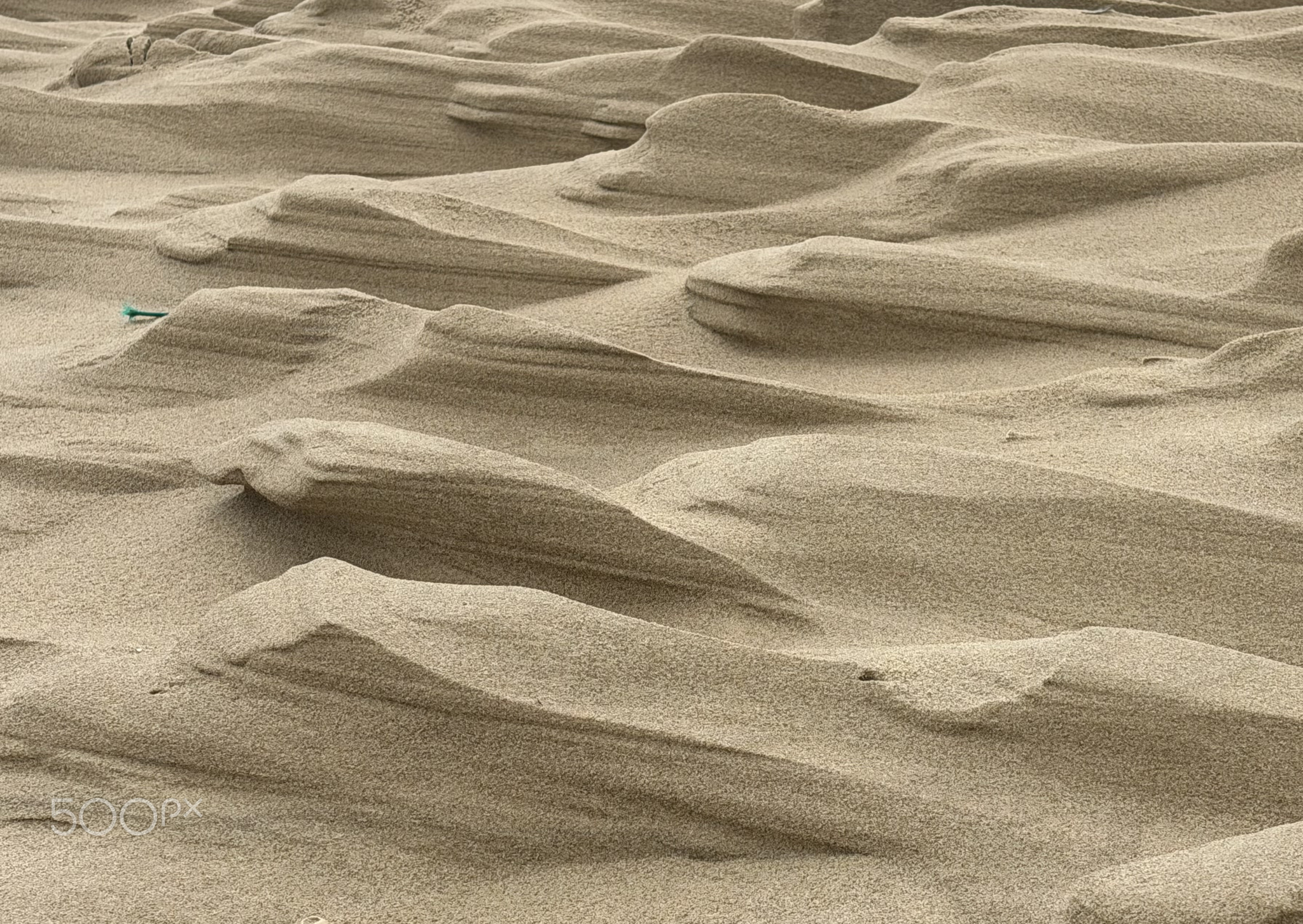 Natural sand sculptures at the beach 