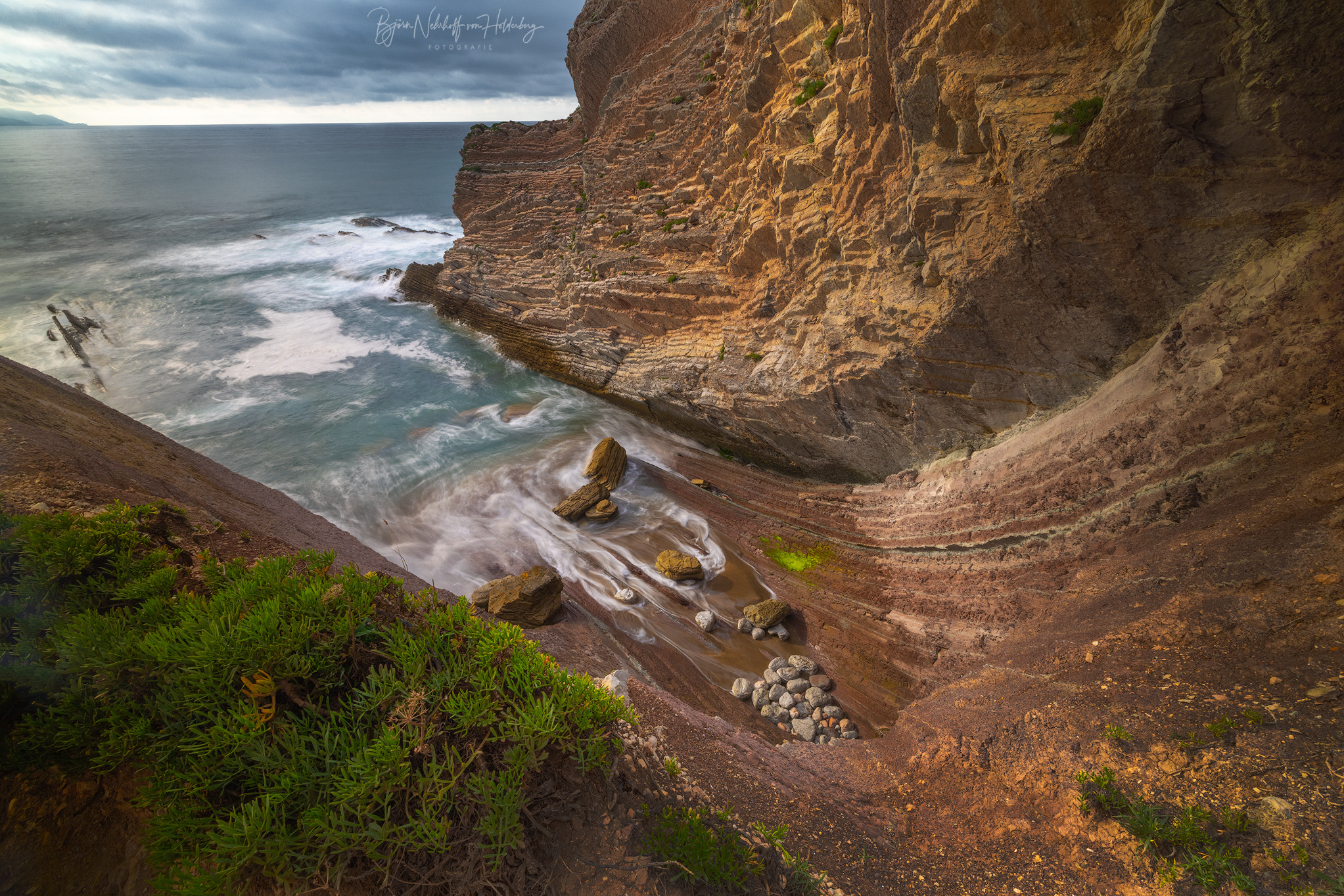Rugged Coastline with Crashing Waves Symbolizing Resilience