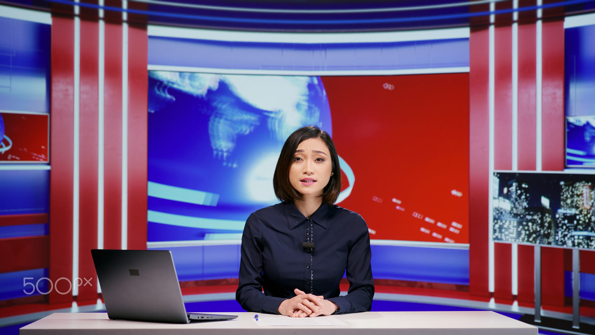 Asian presenter hosting news segment: Asian presenter hosting news segment on live program, addressing all headlines in newsroom. Woman media journalist presenting breaking news and global events, television content newscast.