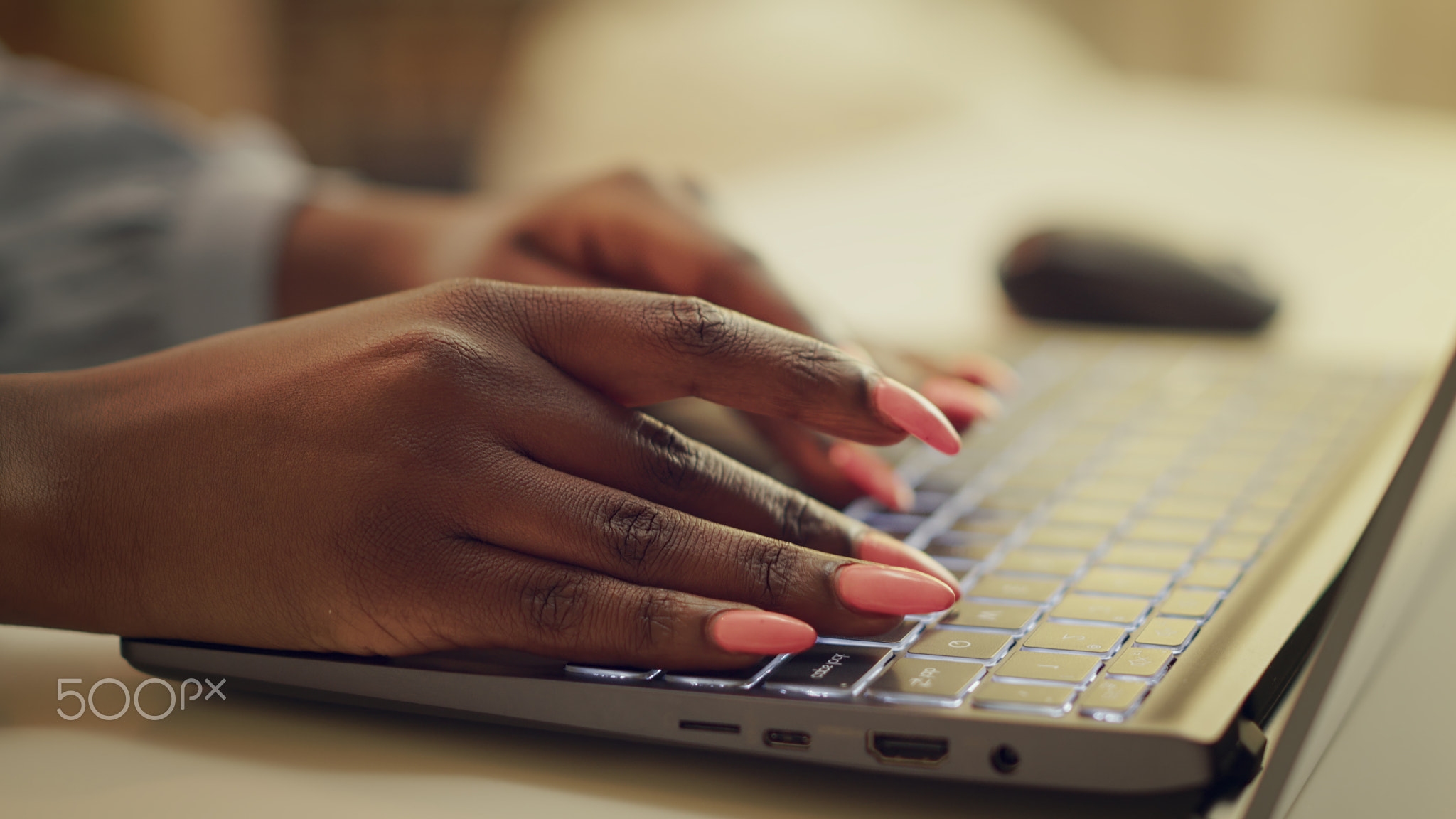 Teleworker typing new story ideas