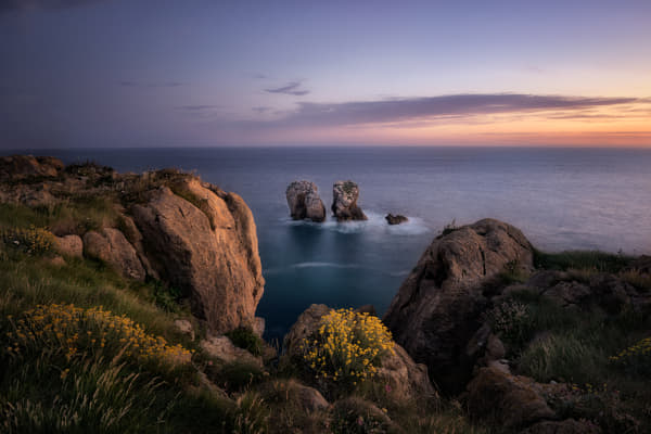 Coastal Cliffs at Dusk Reflecting Serene Majesty | landscape photo