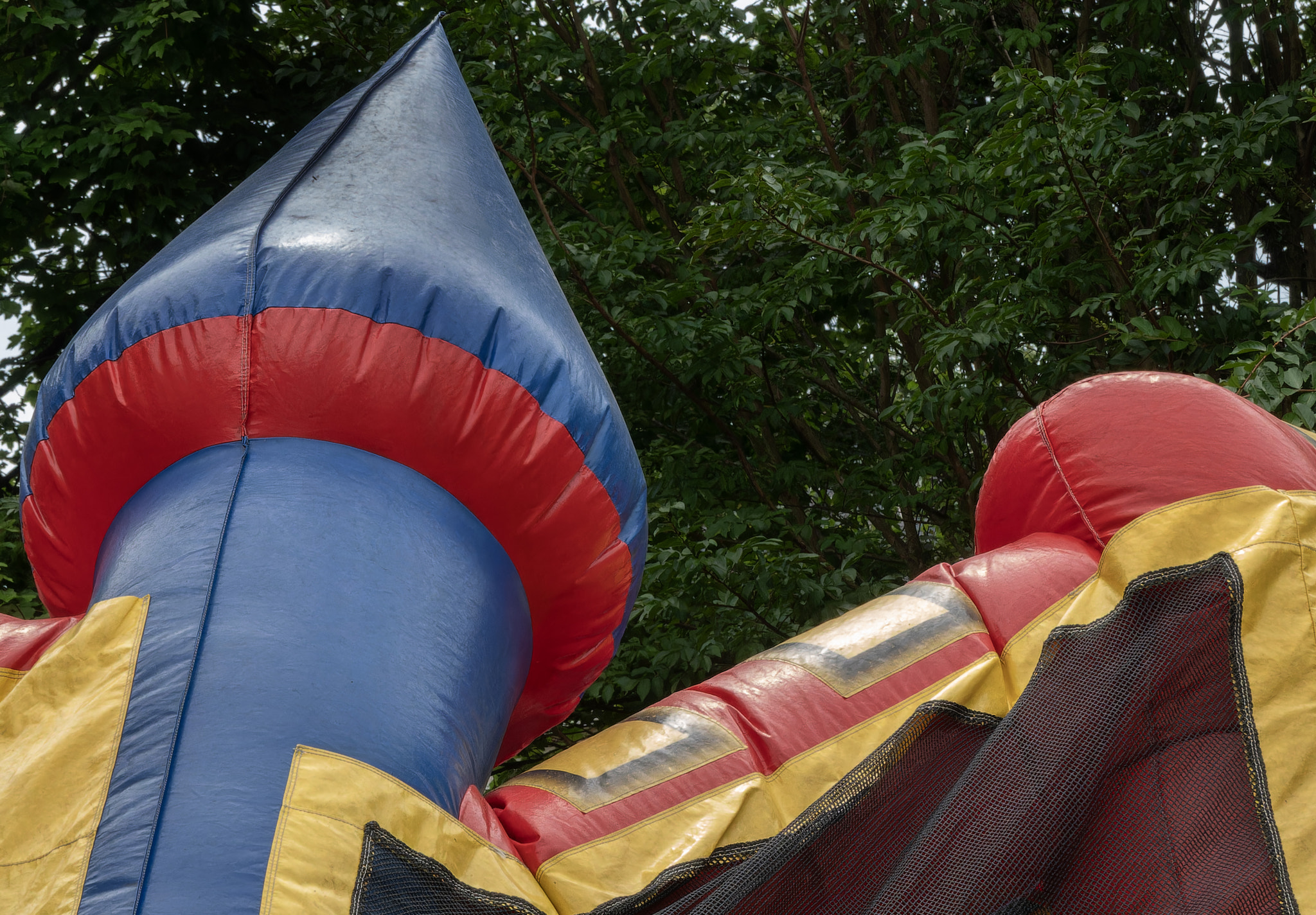 Low section of person with inflatable ring on field