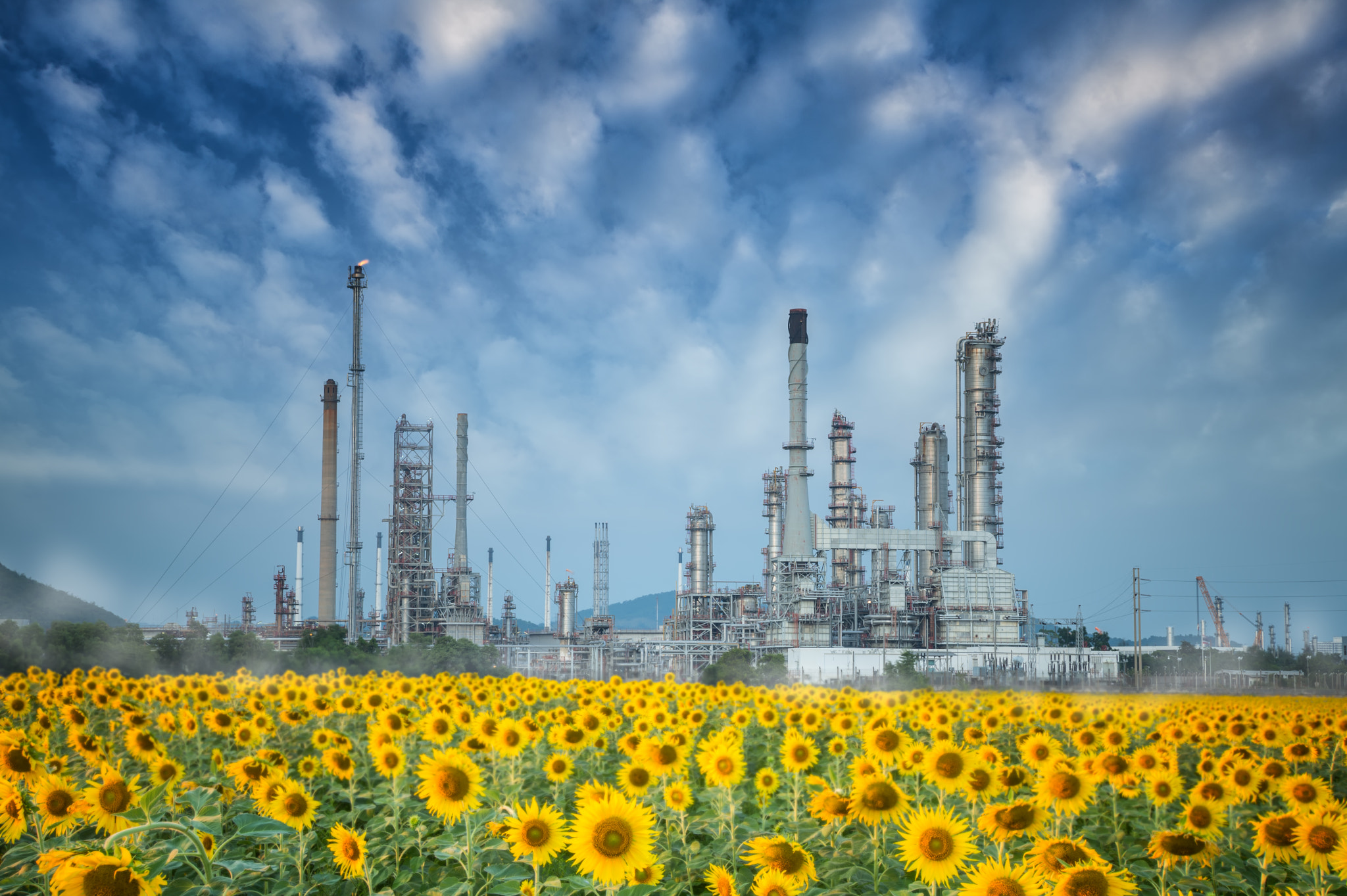 Oil refinery along twilight sky