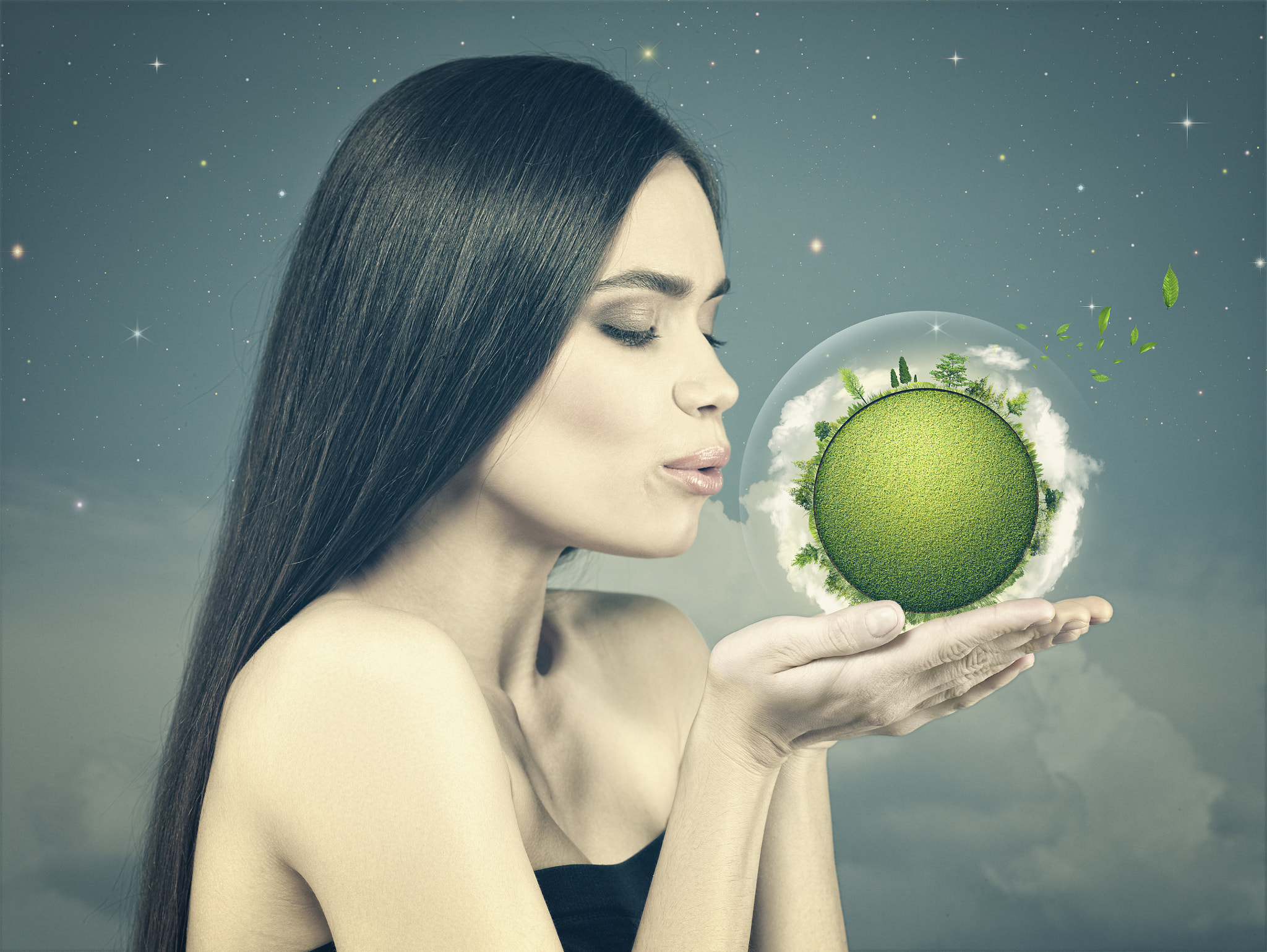 Eco female portrait with beauty white girl holding green planet