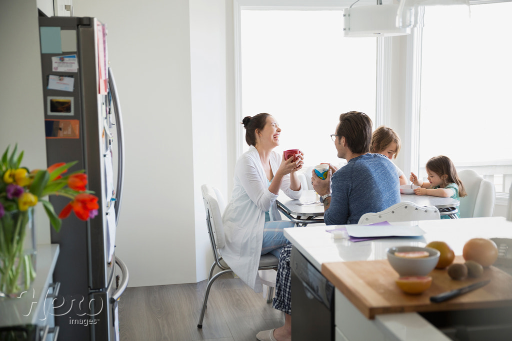 Family in pajamas enjoying breakfast