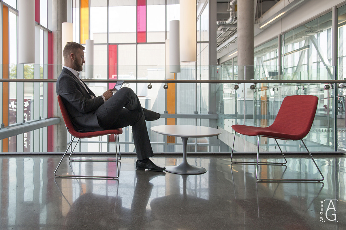 Andrew working with tablet in modern environment