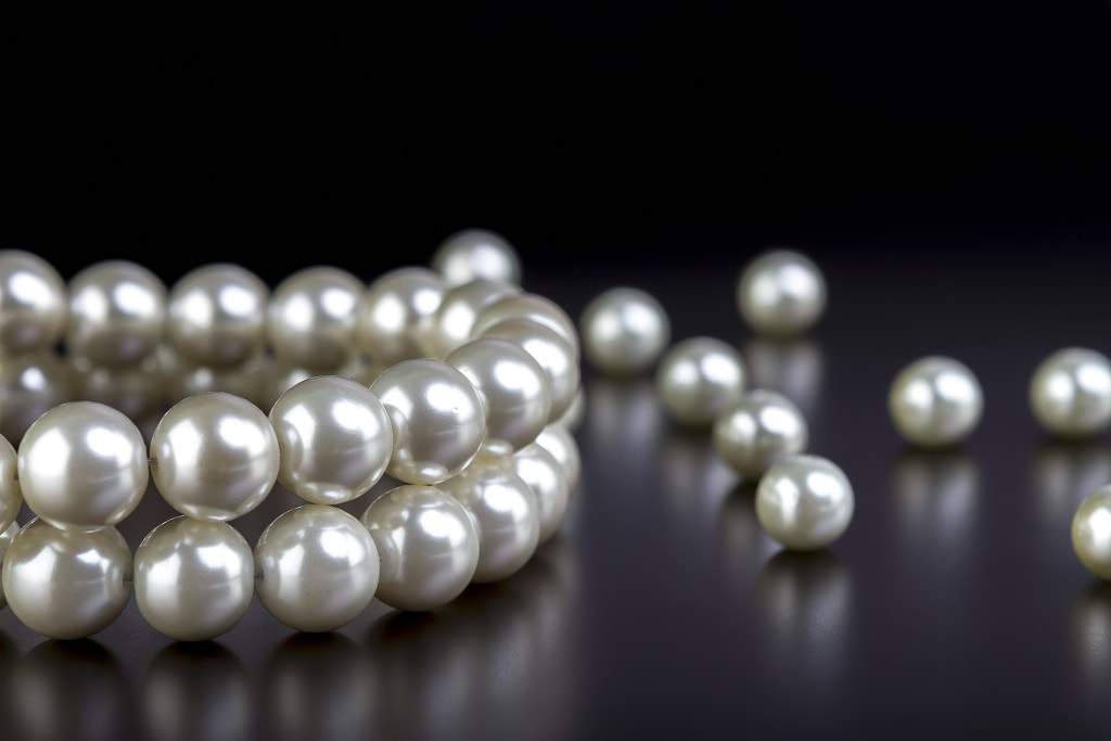 white pearls necklace on black by Sanda  Stanca on 500px.com