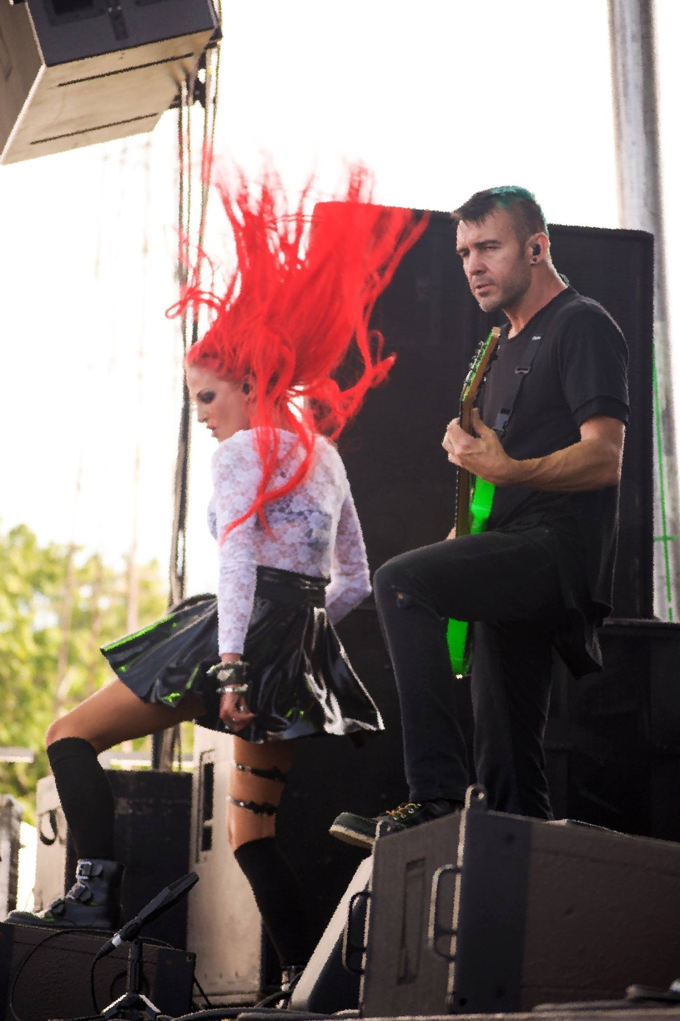 Singer from Butcher Babies in a wild hair moment.