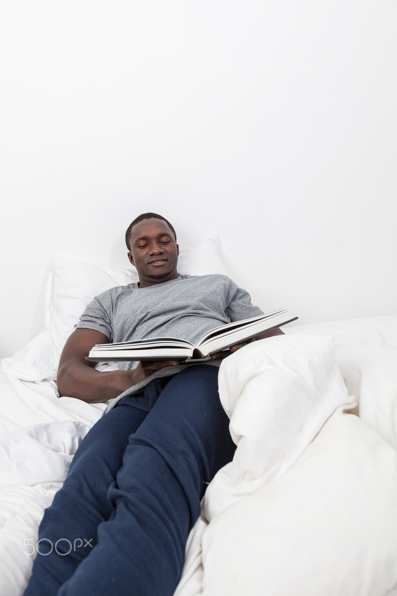 Man looking at book