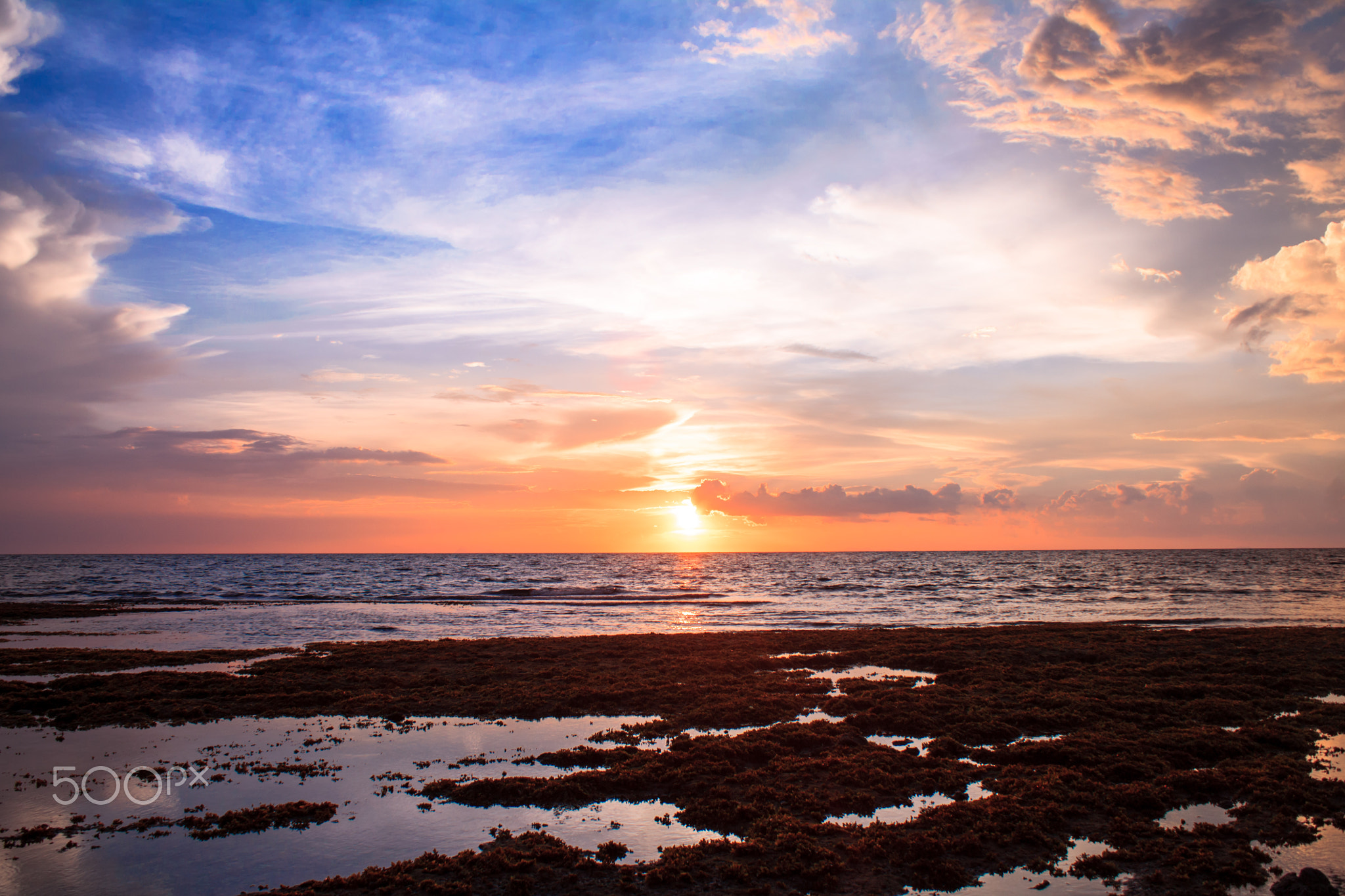 Sunset by the sea