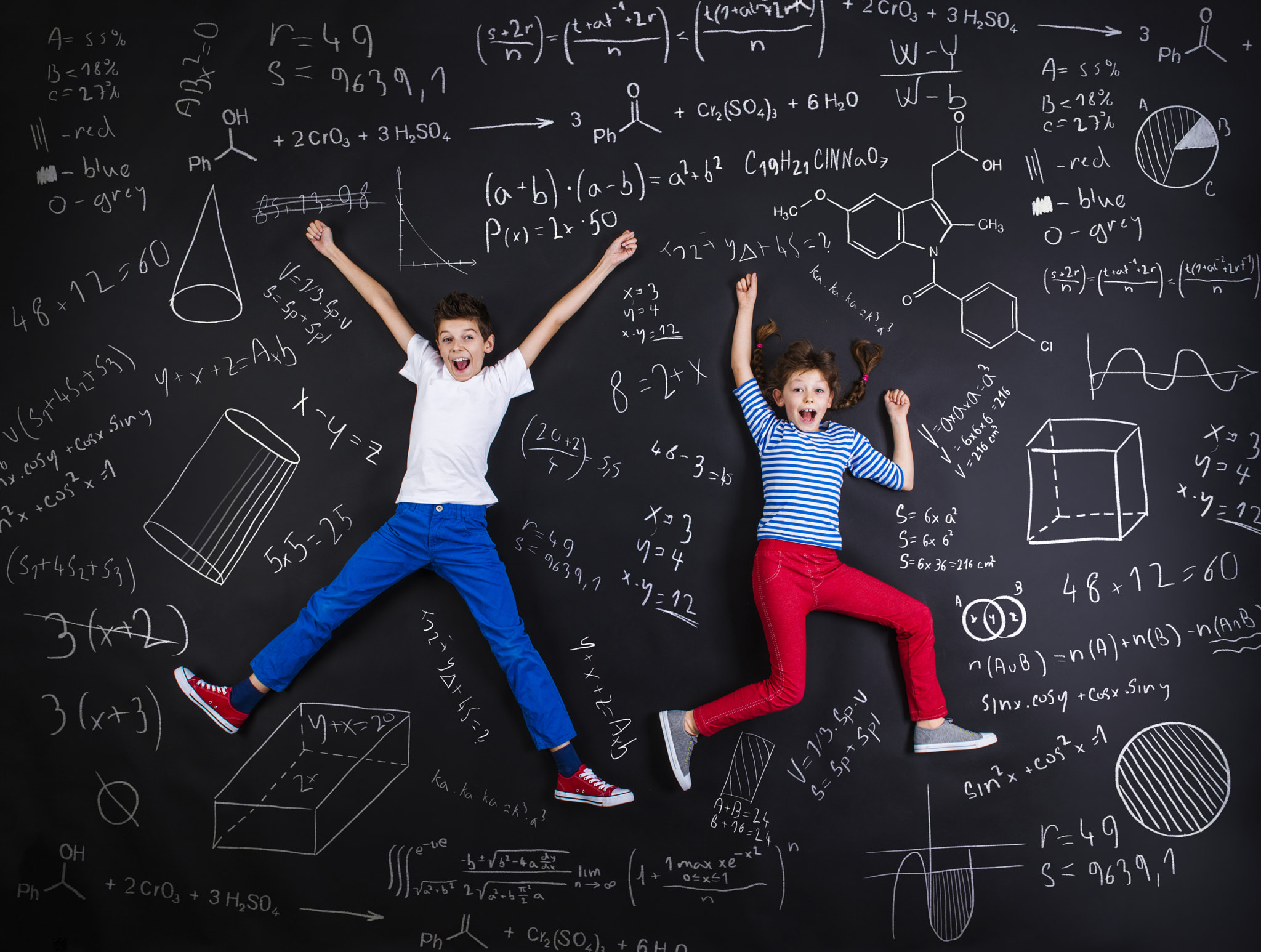 Two schoolkids learning