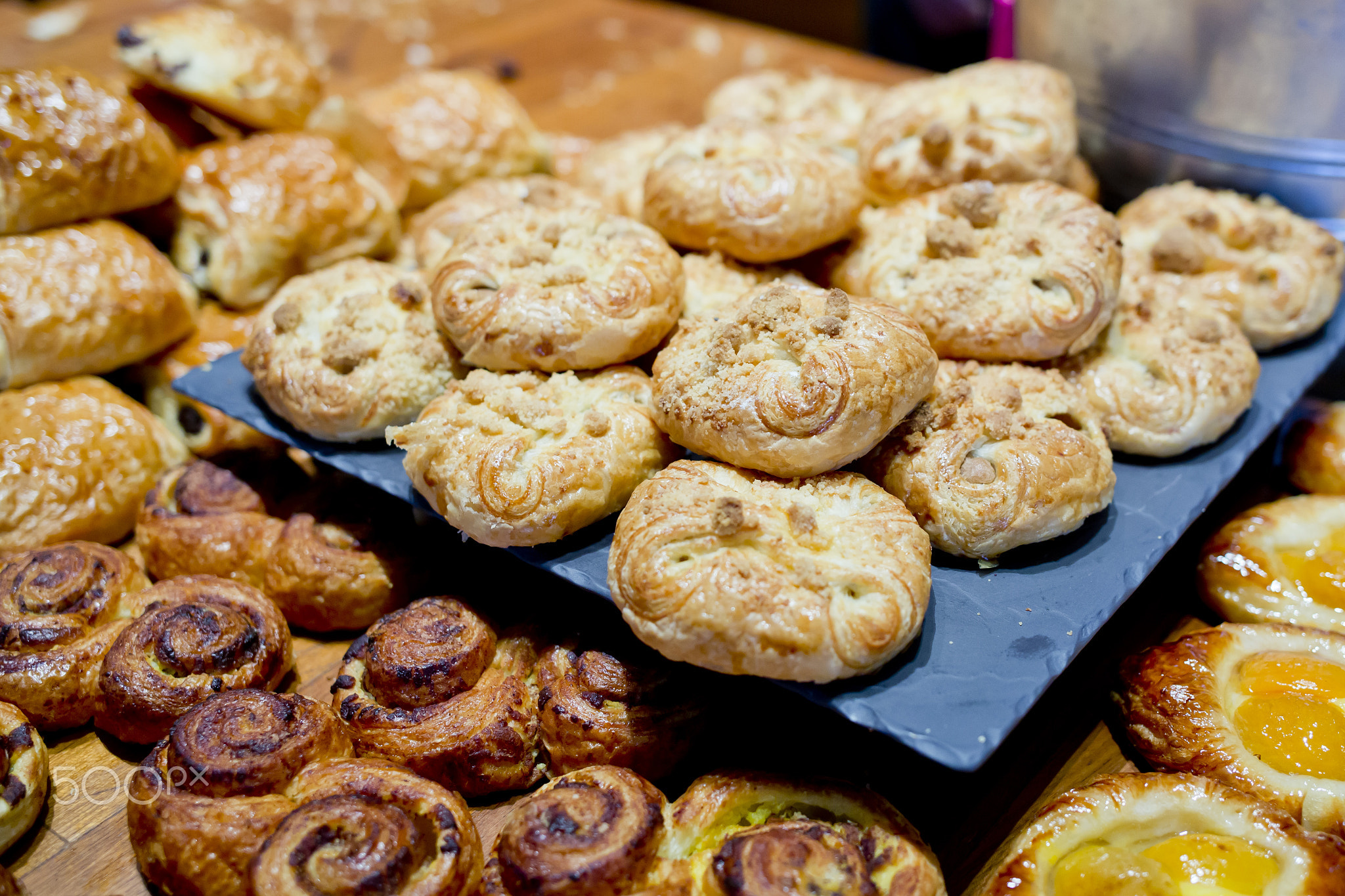 Sweet buns on cutting board.