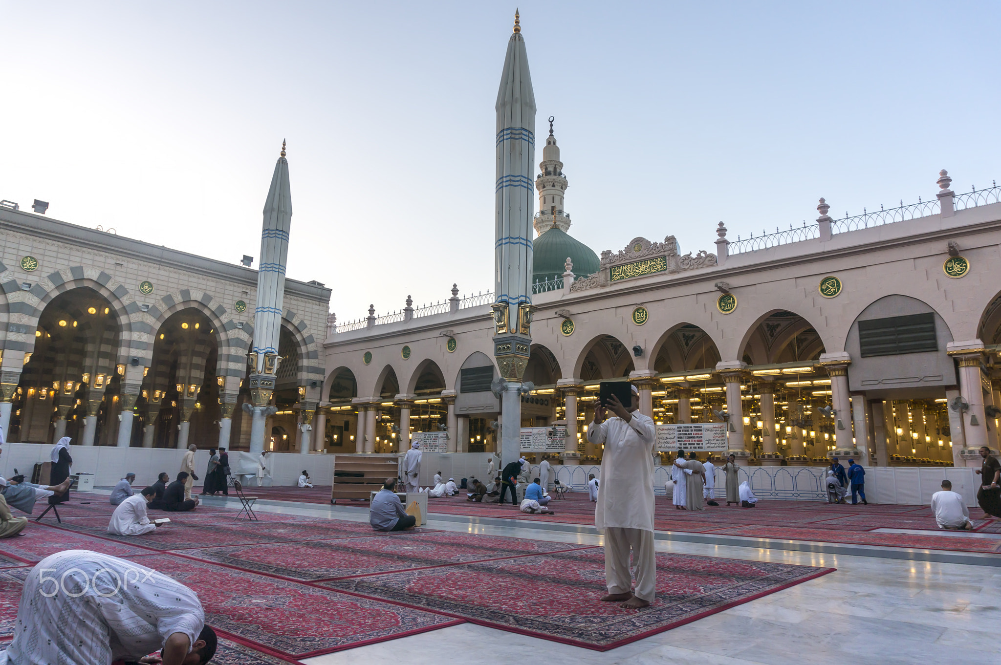 MEDINA-MAR 9 : Muslims read Quran and pray inside of Masjid Nabawi March 9, 2015 in Medina, Saudi Ar