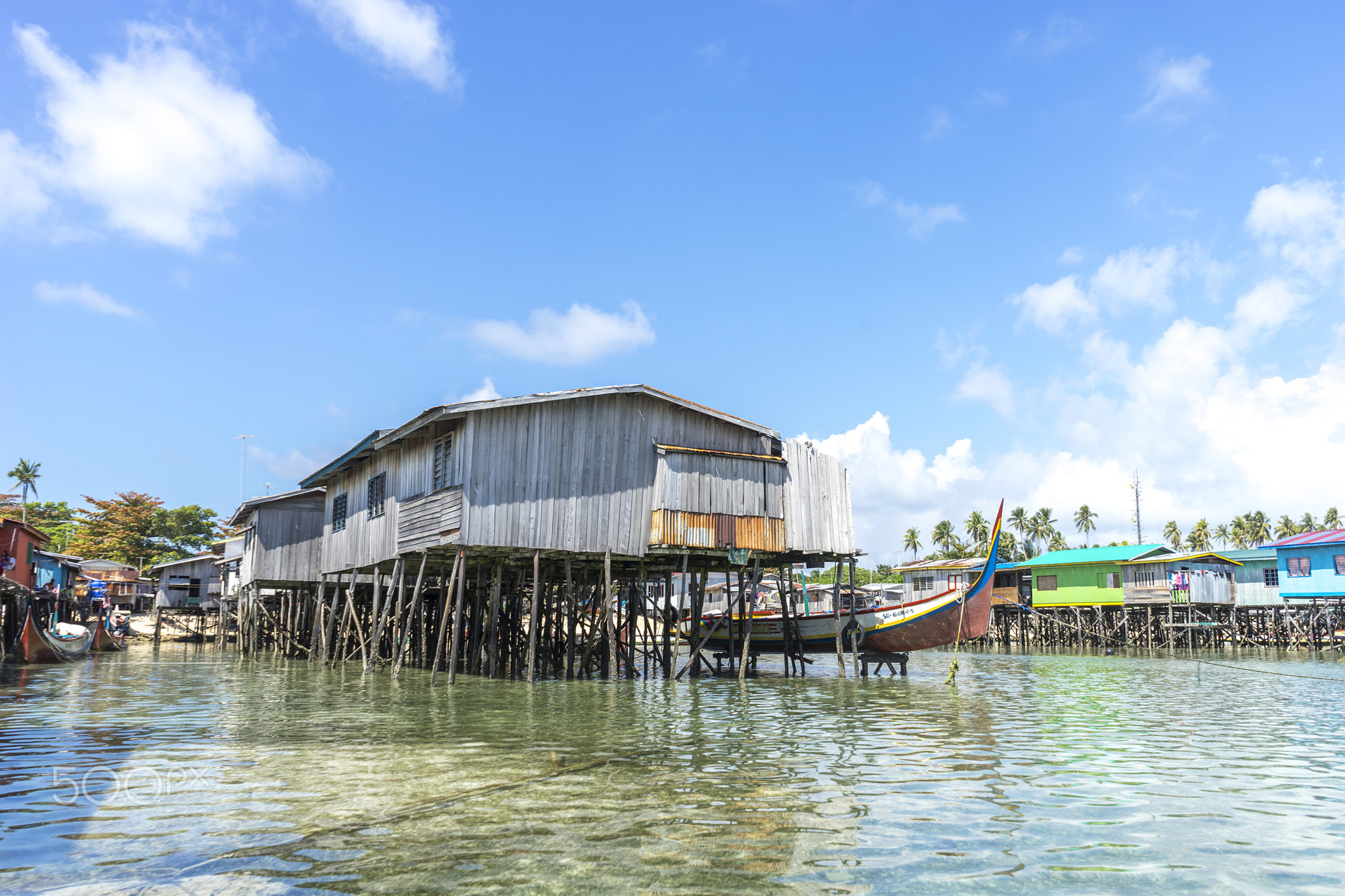 SABAH, MALAYSIA - AUGUST 15, 2015 : Traditional floating resort at Mabul Island, Sabah, Malaysia.