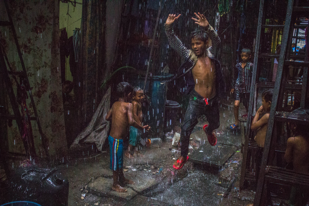 kids playing in the rain by Yash Sheth on 500px.com
