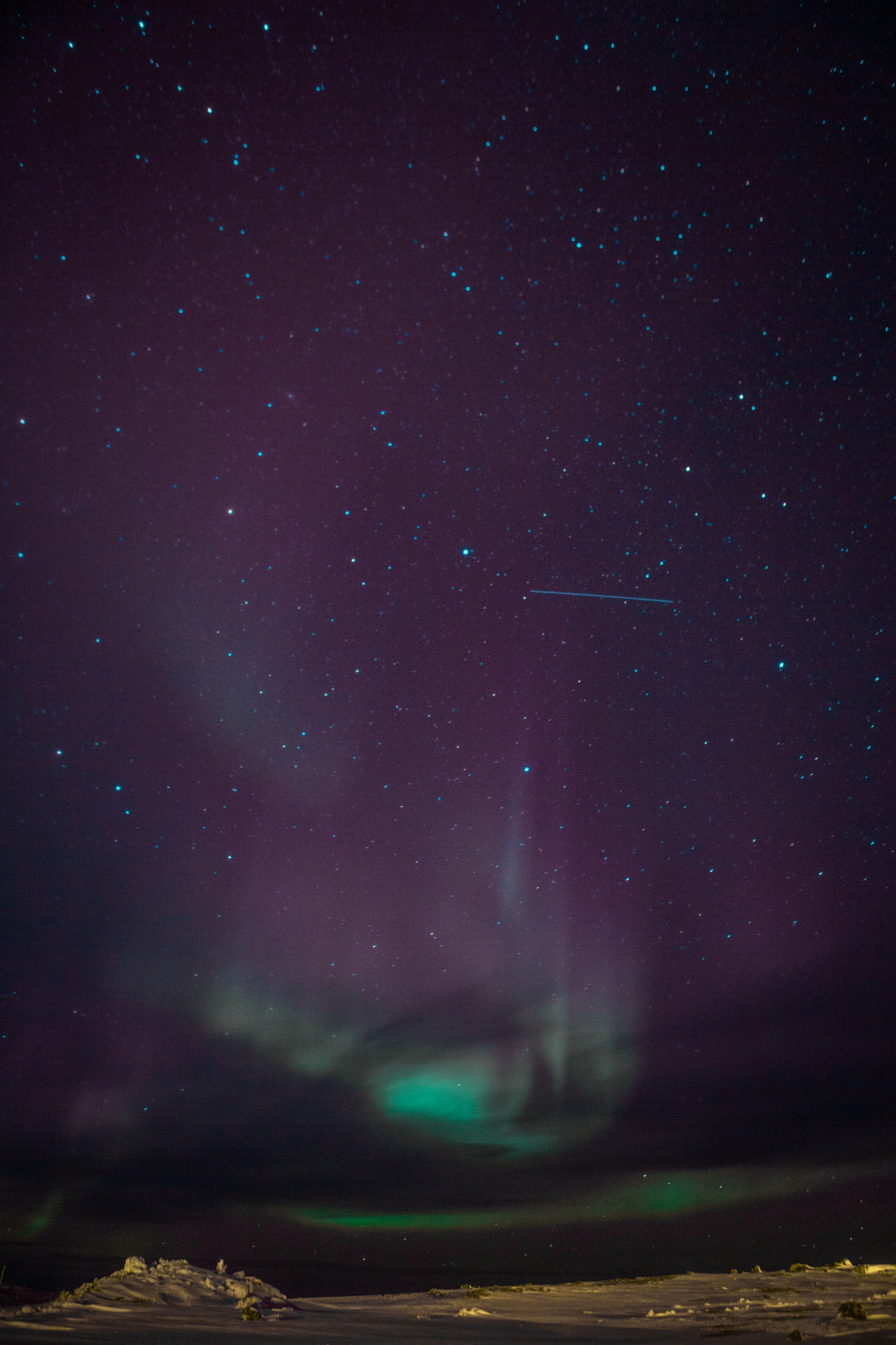 Shooting Star in the Northern Lights