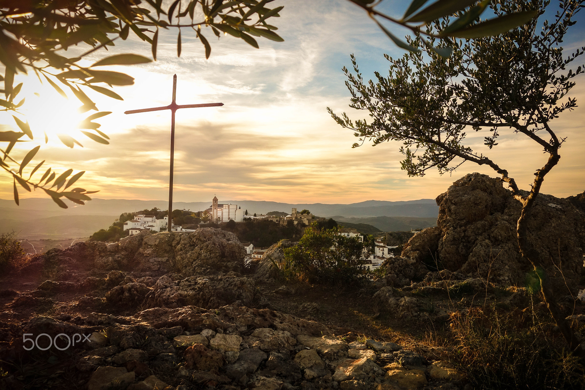 Sunset over Andalusian white village Casares in South Spain