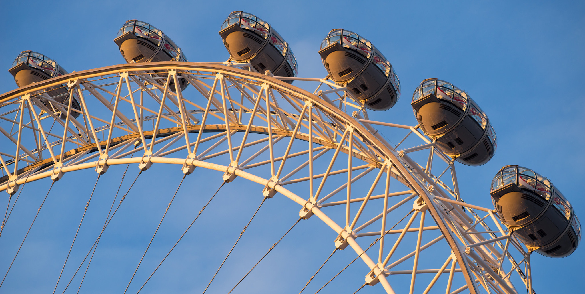 ZEISS Apo Sonnar T* 135mm F2 sample photo. London eye capsules in early morming sun photography