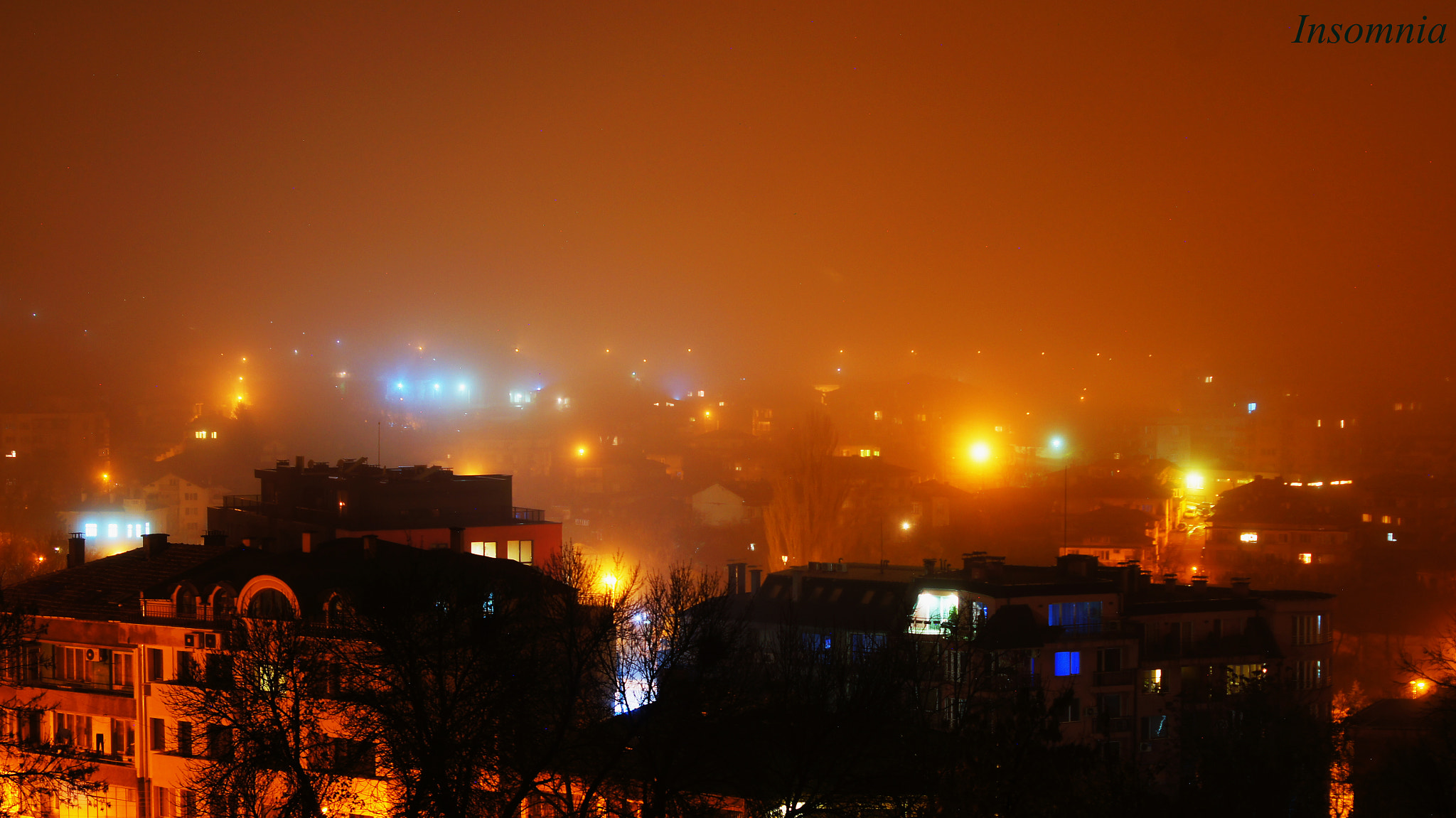 35-70mm F4 sample photo. Noise city in the fog photography